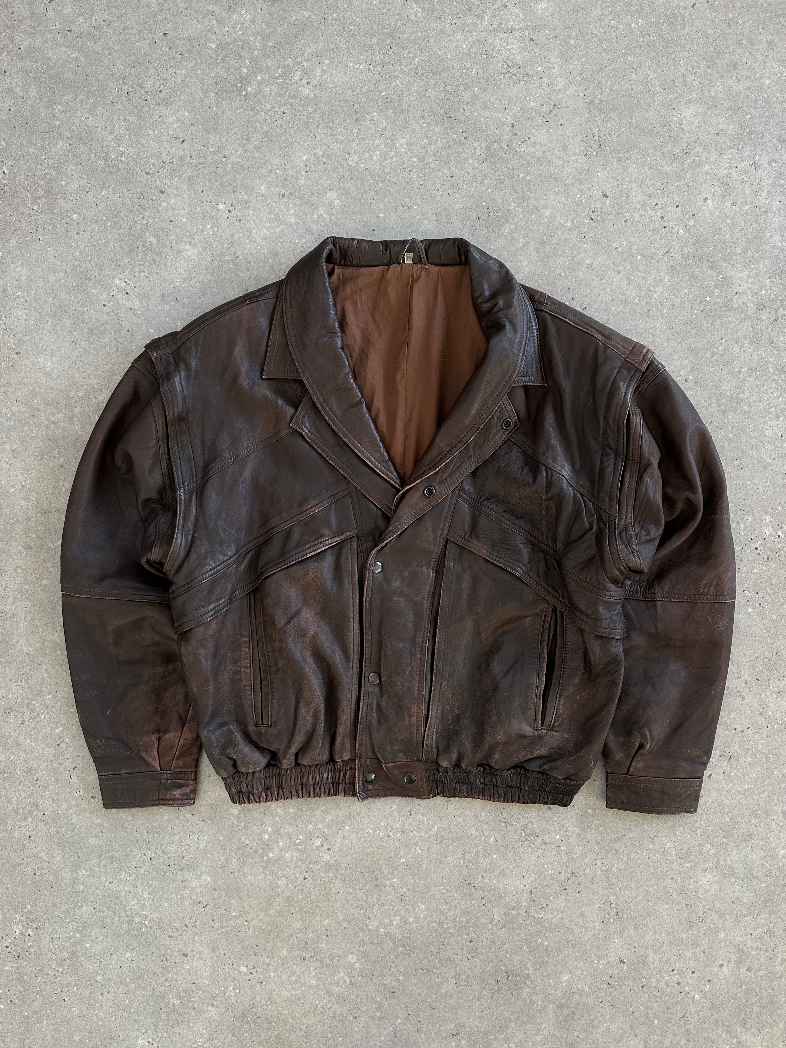 Vintage 1990s aged double collar leather bomber jacket in XL, displaying distressed leather and classic design details.