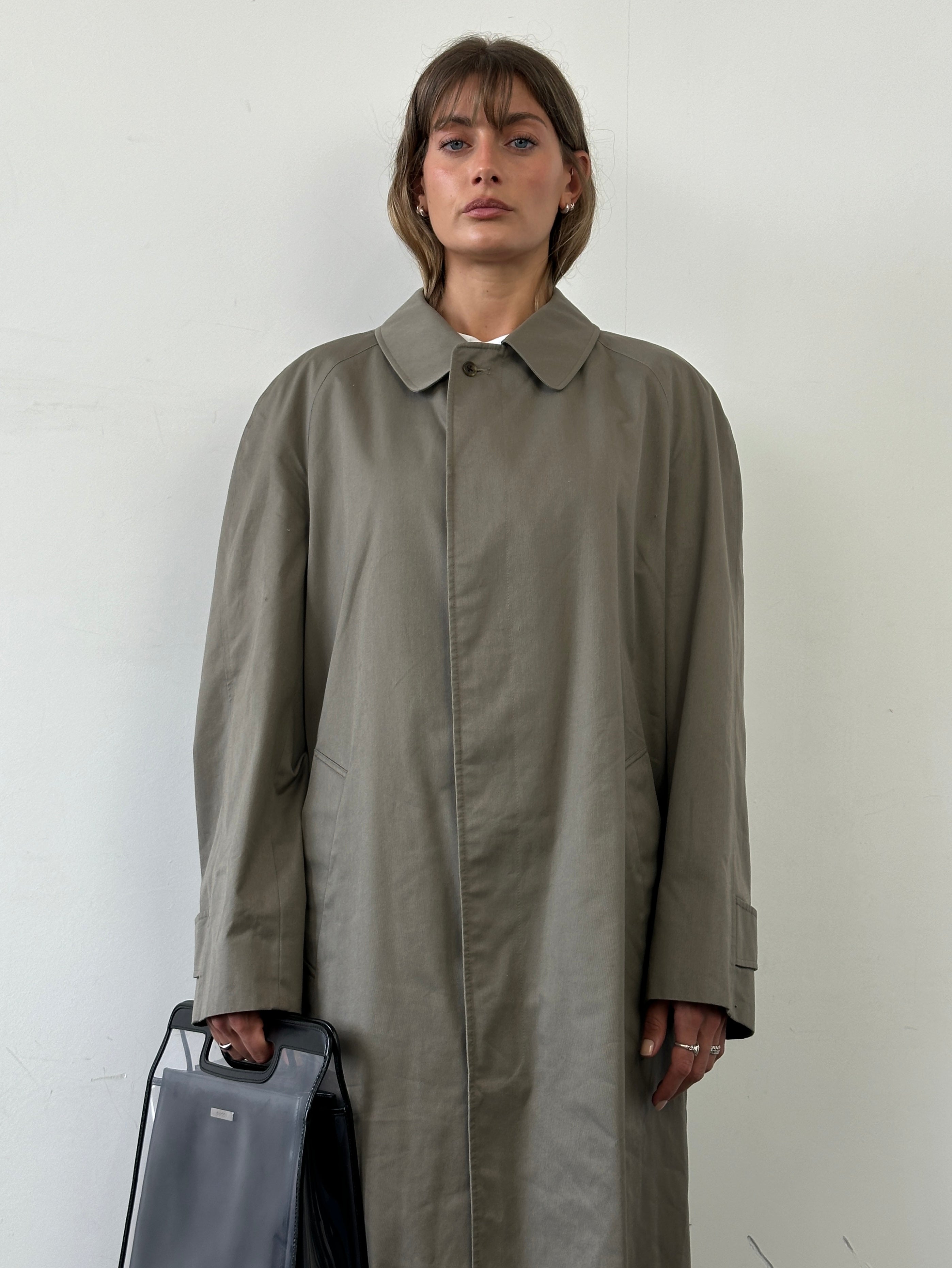 Aquascutum cotton trench coat with concealed placket in XL size, featuring classic design and tailored fit.