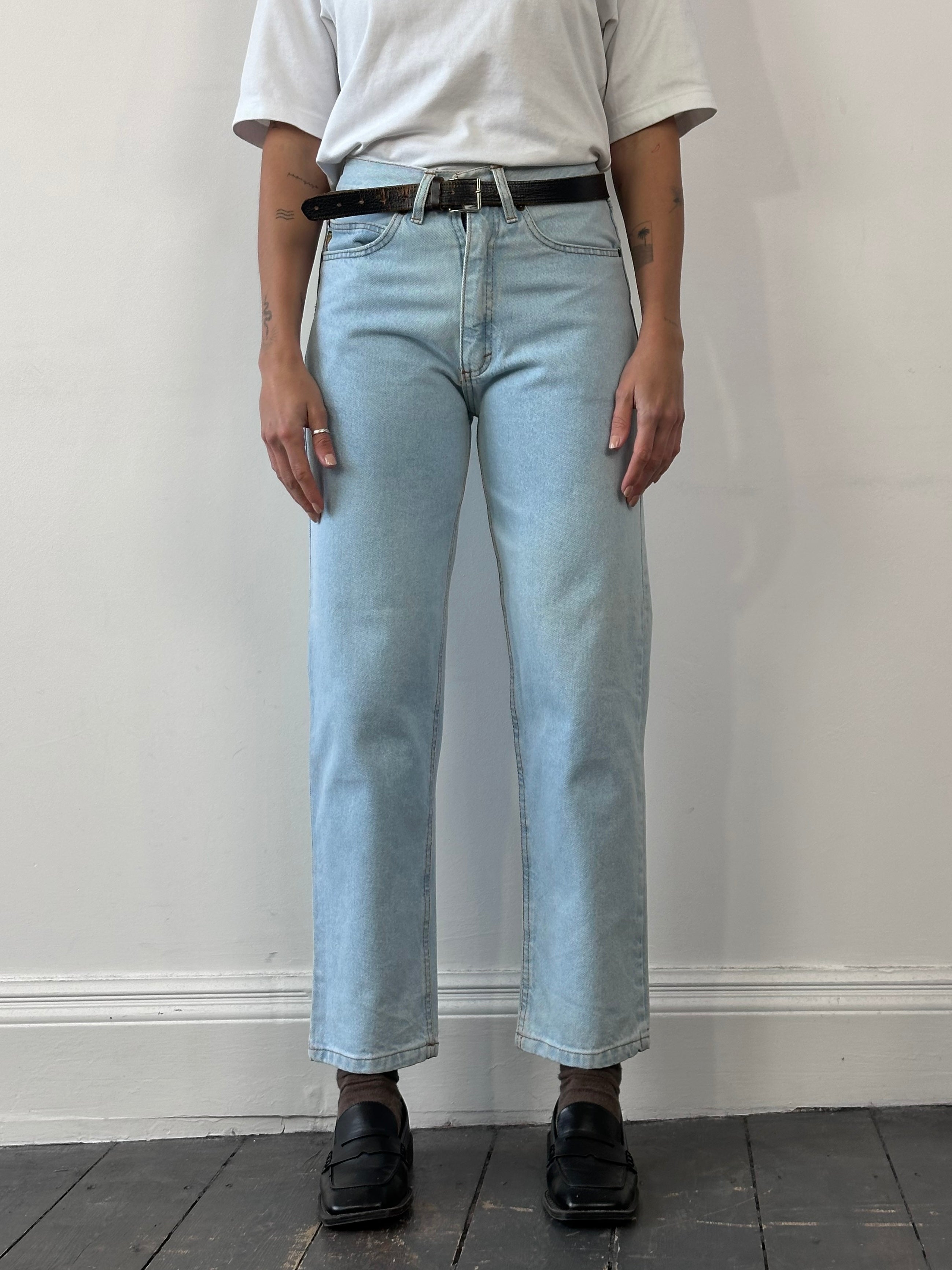 Armani Jeans light wash tapered leg denim jeans with W26 waist, featuring classic five-pocket design and subtle fading.