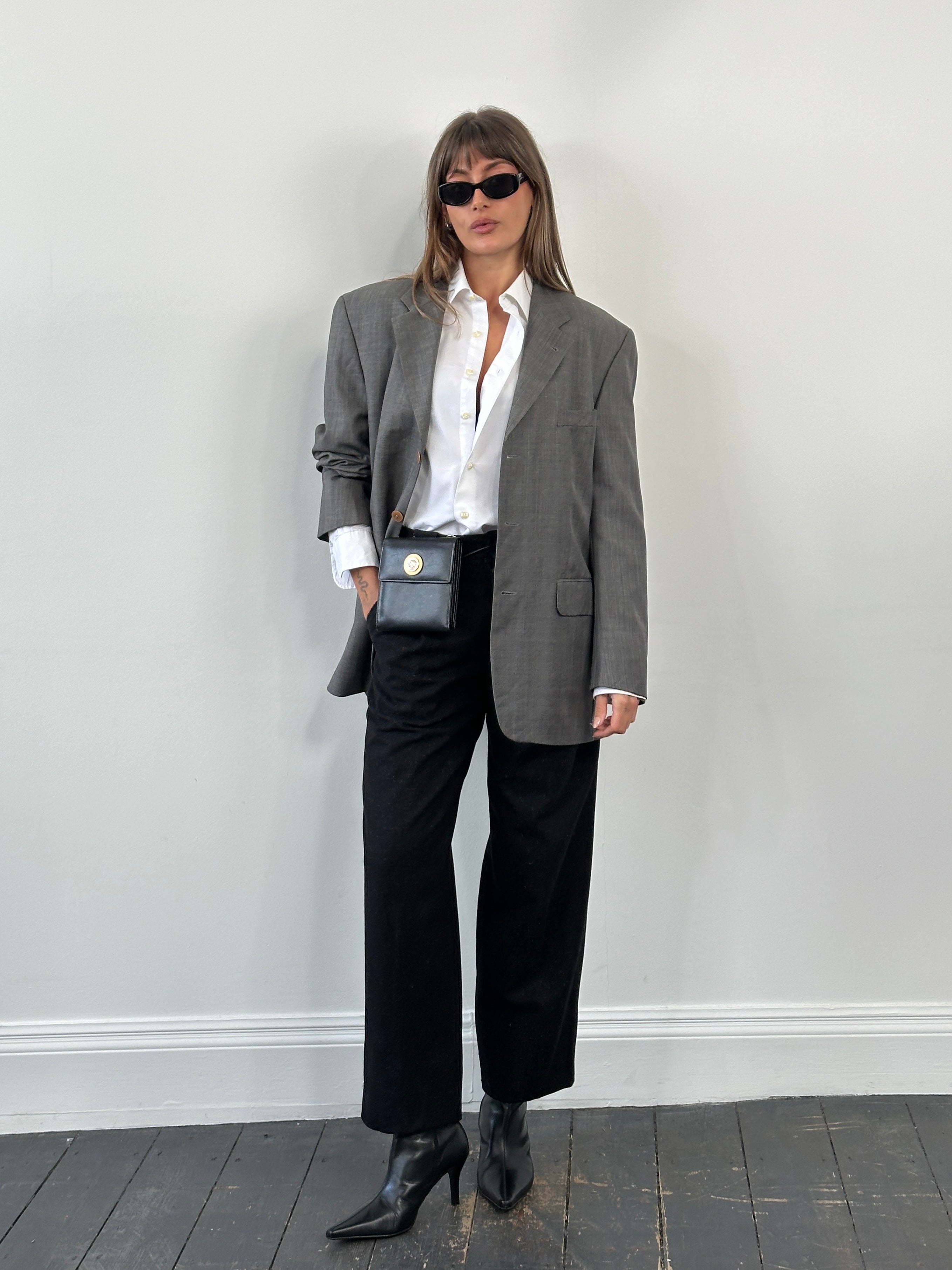 Yves Saint Laurent Pour Homme 1990s pure wool single-breasted blazer in size 40R/L, shown hanging with classic tailored fit