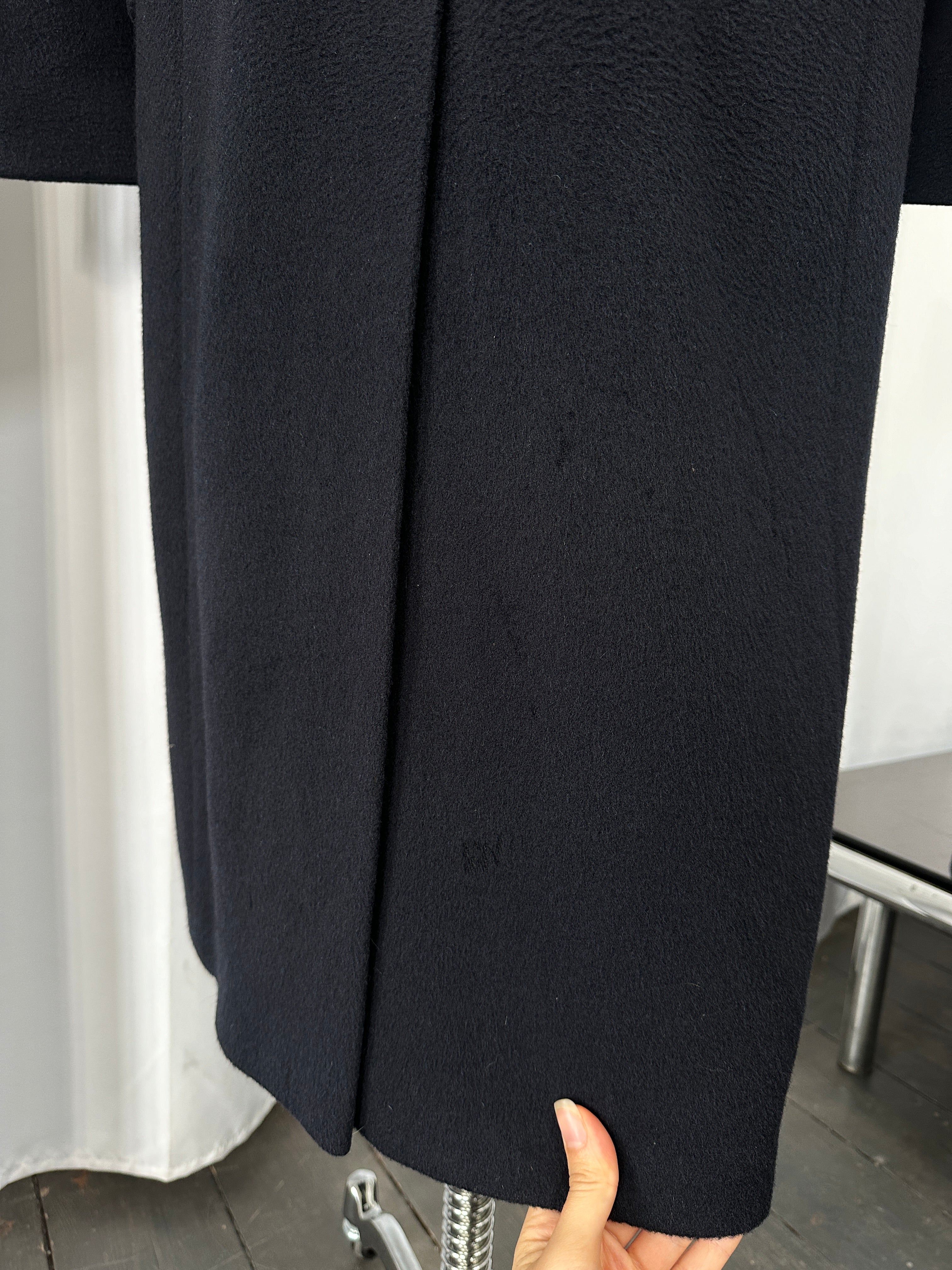 Vintage British 1990s wool and cashmere double-breasted coat in size XL, featuring a classic tailored design and textured fabric.