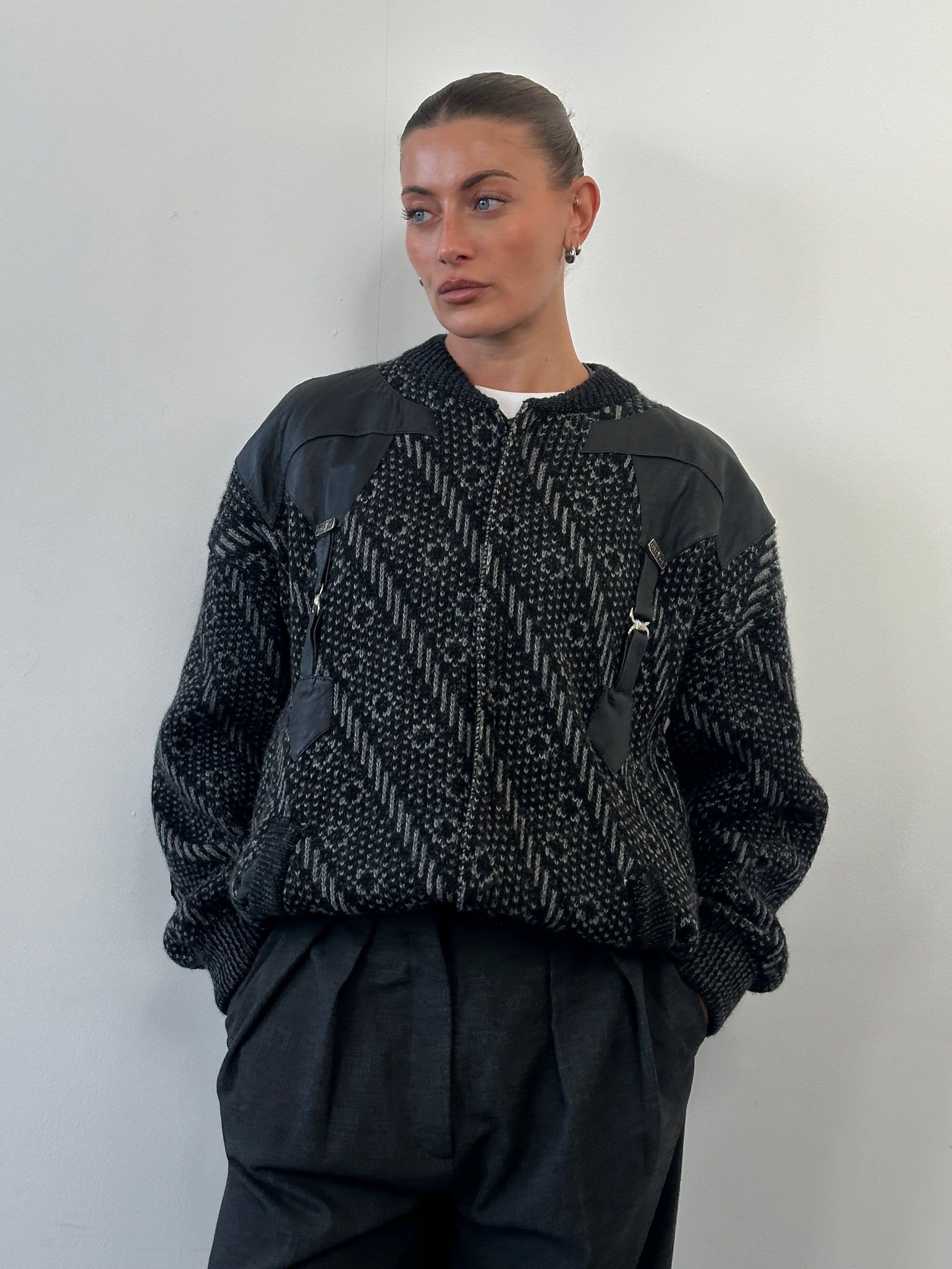 Vintage 1980s wool print knit bomber jacket in XL with a classic retro design and ribbed collar and cuffs.