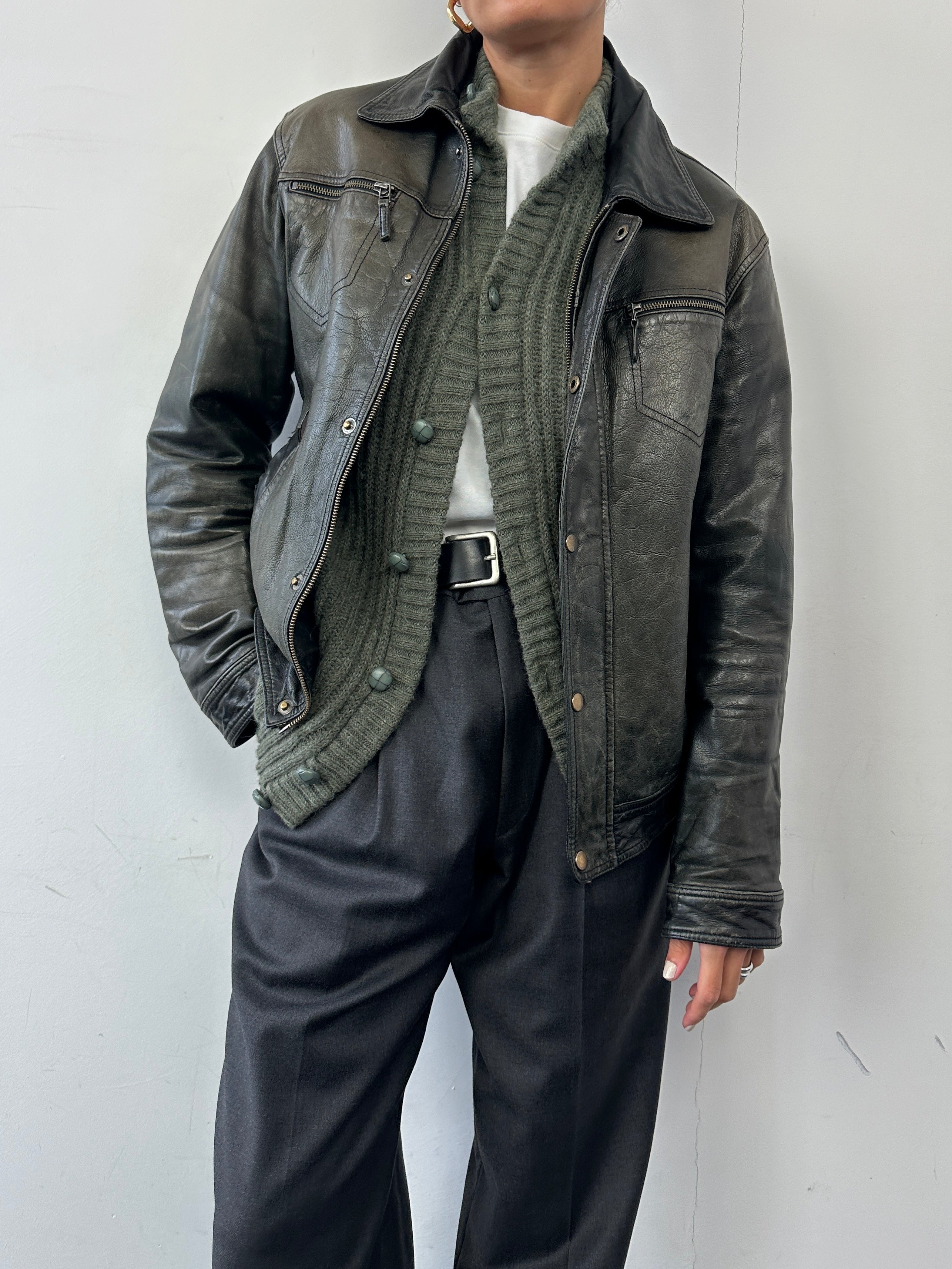 Conbipel distressed leather jacket in size M, featuring a rugged design with worn-in texture and stylish details.