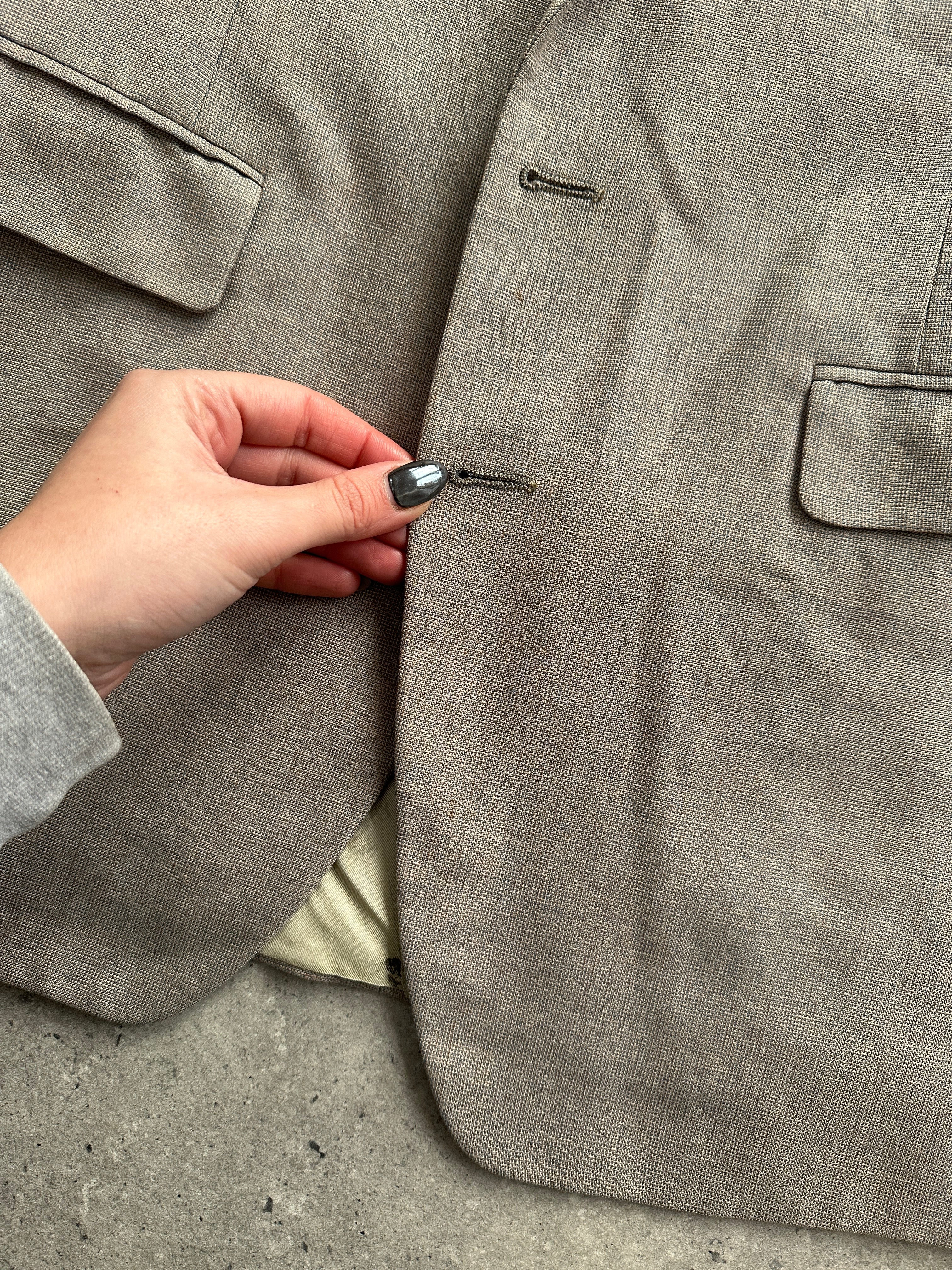 Givenchy wool single-breasted blazer in size M, tailored fit with notch lapel, displayed on a neutral background.