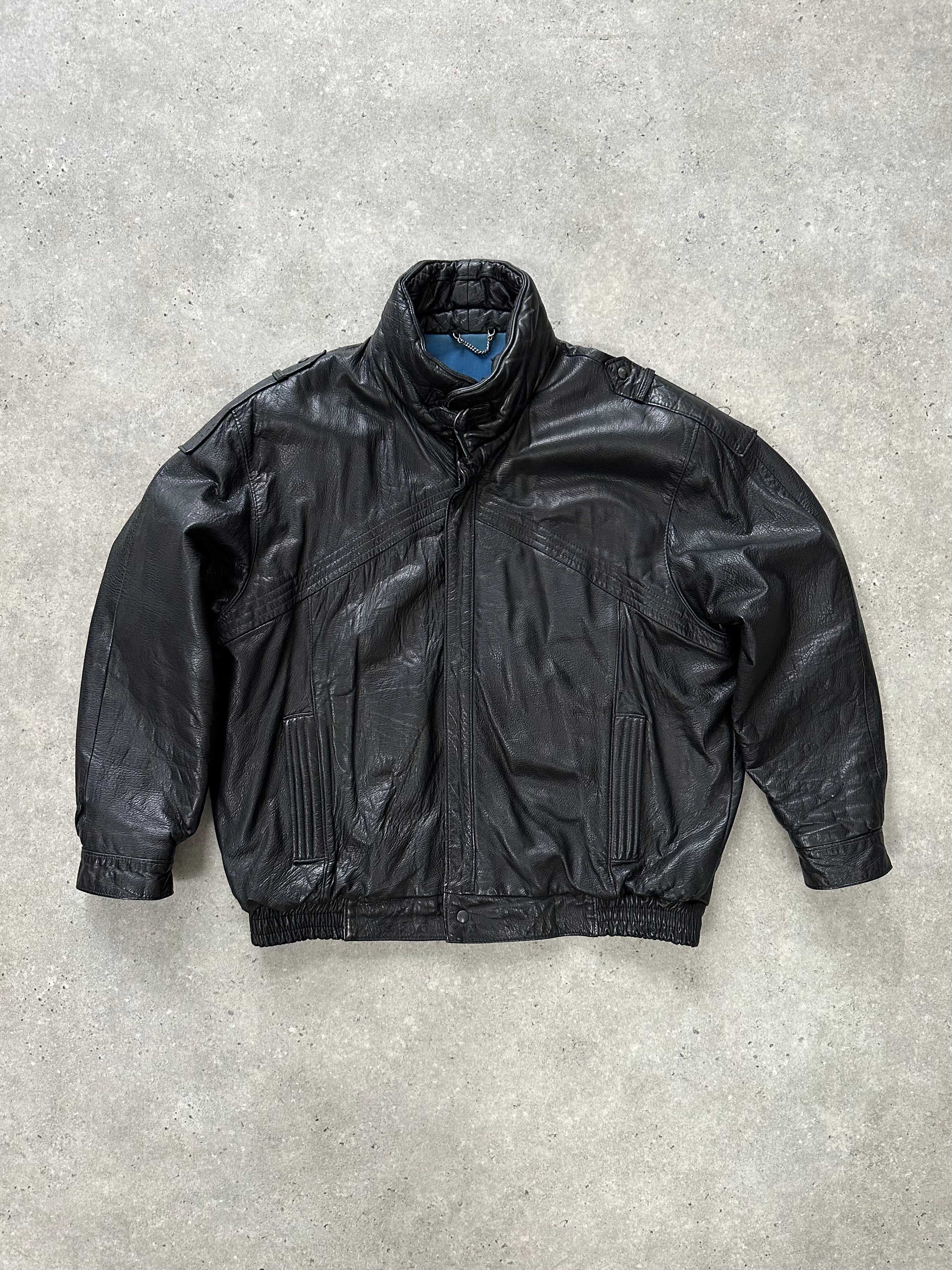 St Michael 1980s high neck leather bomber jacket in black, displayed on a hanger showing its classic design and high collar.