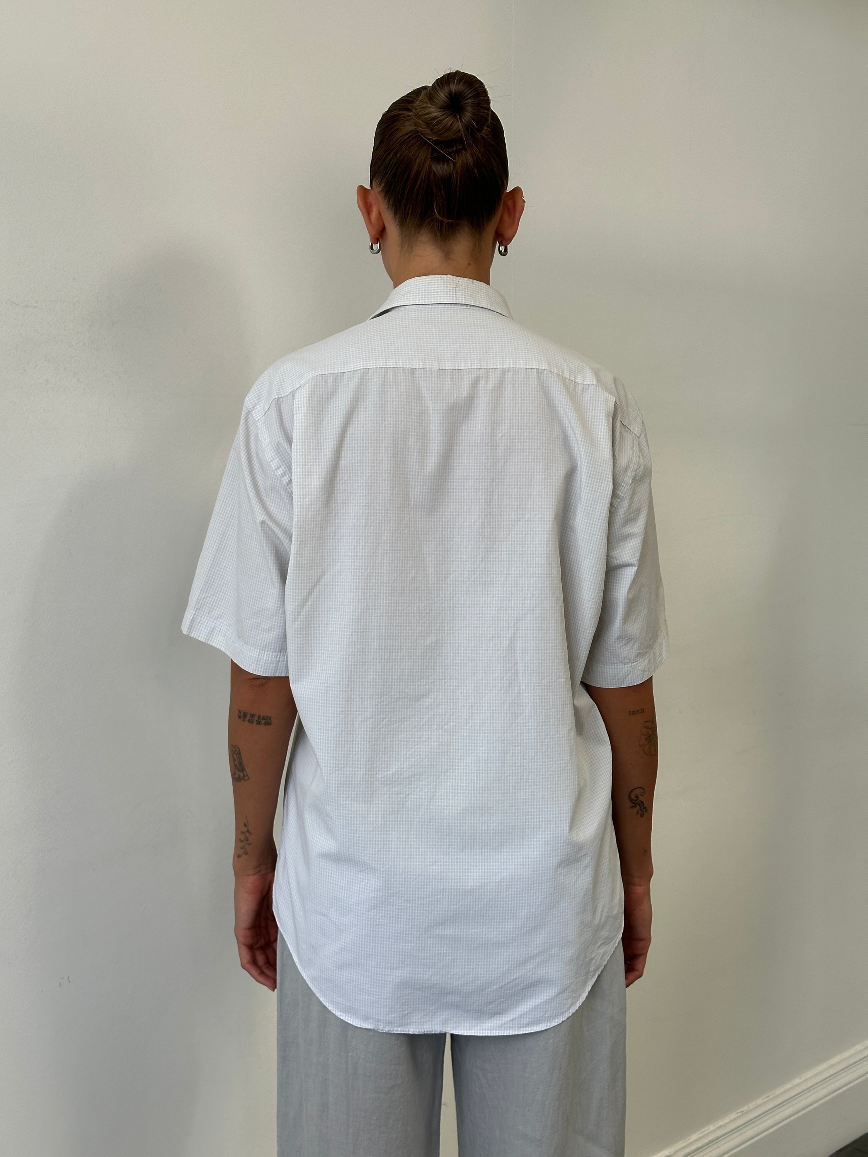 Yves Saint Laurent Pour Homme cotton check short sleeve logo shirt in size L, featuring a classic check pattern and YSL branding.
