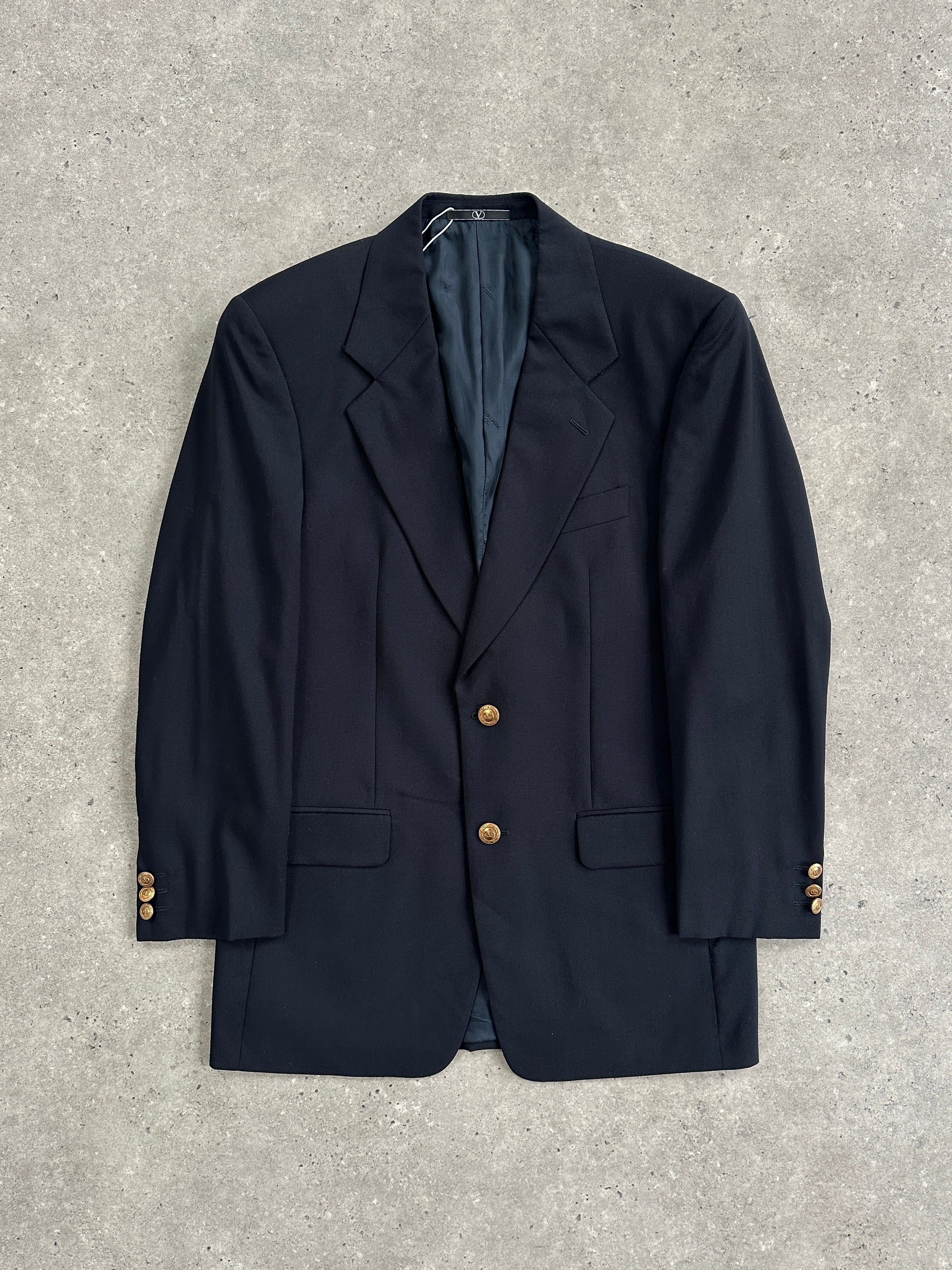 Valentino bespoke pure wool single-breasted blazer in size 36R/M, tailored fit with classic lapels and button closure.