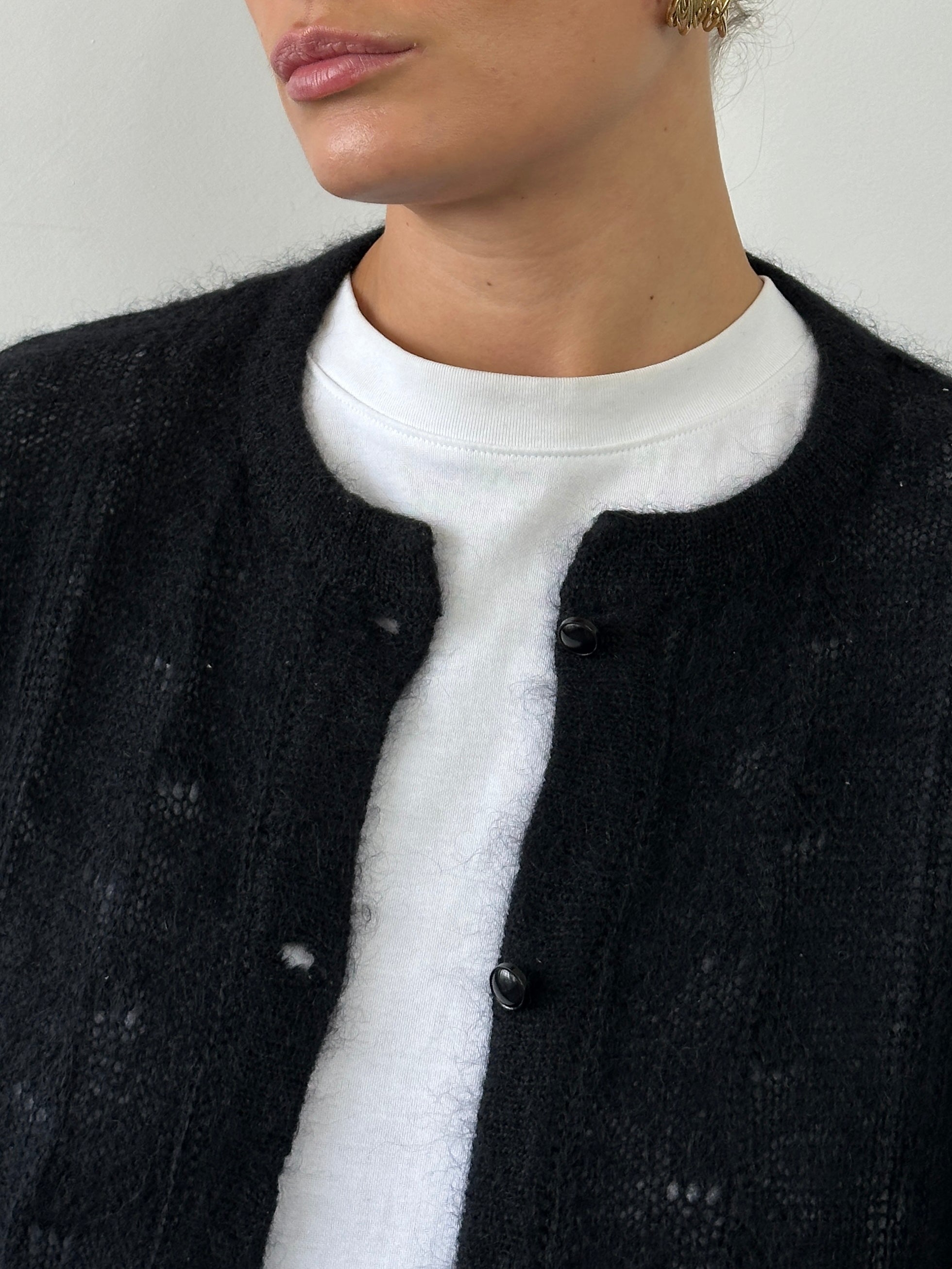 Vintage Italian vintage mohair wool cardigan in M/L size, soft textured knit with classic design and button details.