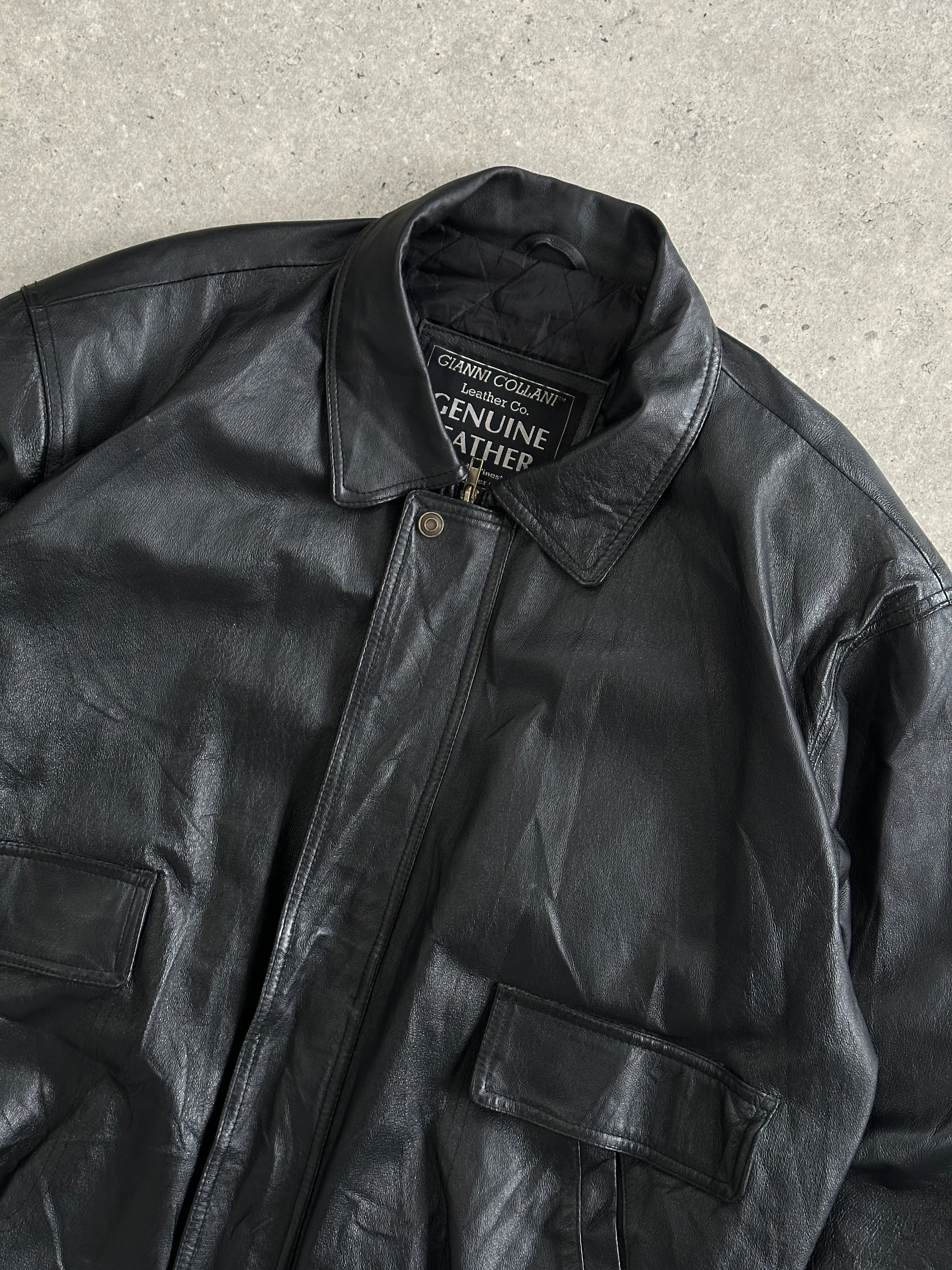 Vintage leather bomber jacket in XL, featuring classic design, soft leather material, and ribbed cuffs and collar.