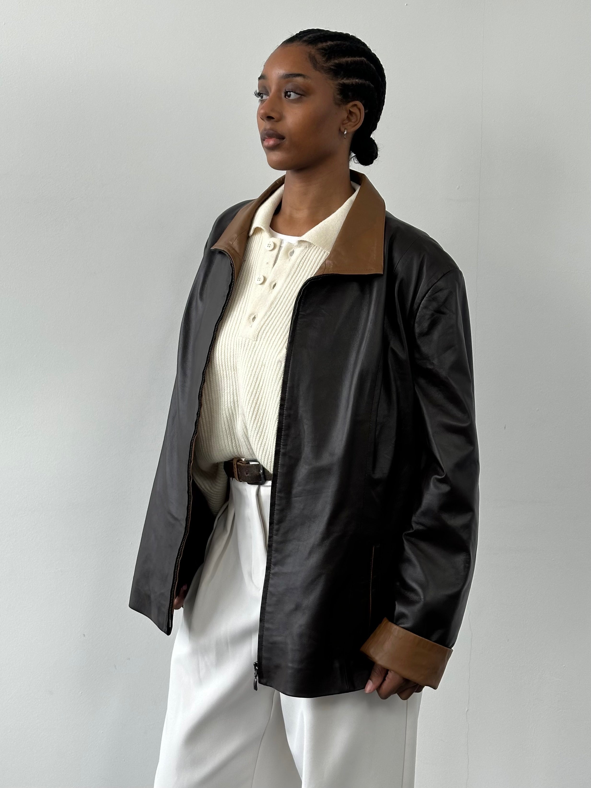 Vintage 1990s high neck leather jacket with contrast panels in XL size, featuring classic vintage style and leather texture.