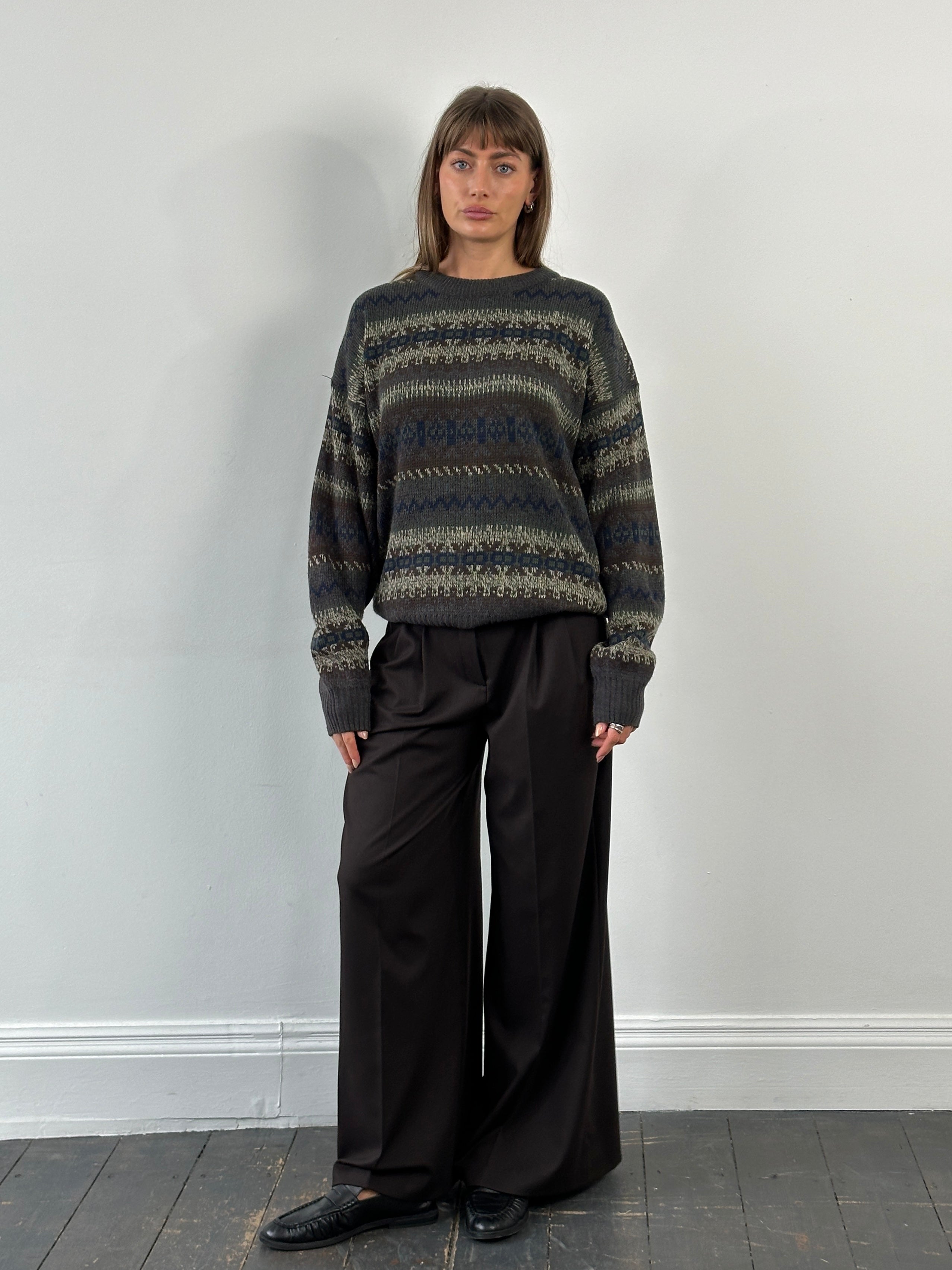 Vintage 1990s Fair Isle knitted jumper in XL, featuring traditional colorful patterns and cozy wool fabric.