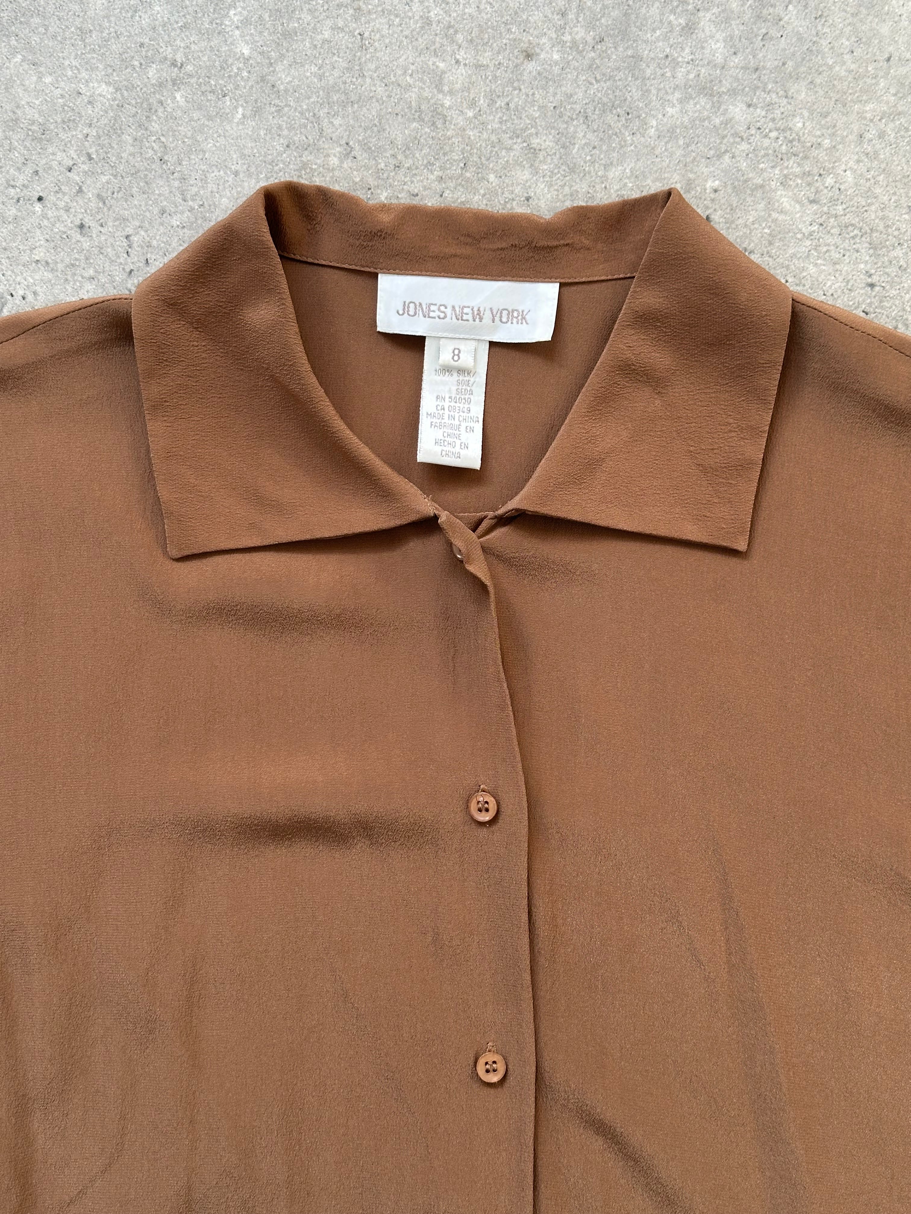 Vintage 2000s pure silk shirt in size S/M, featuring a classic button-down design with a soft, shiny fabric and vintage style.