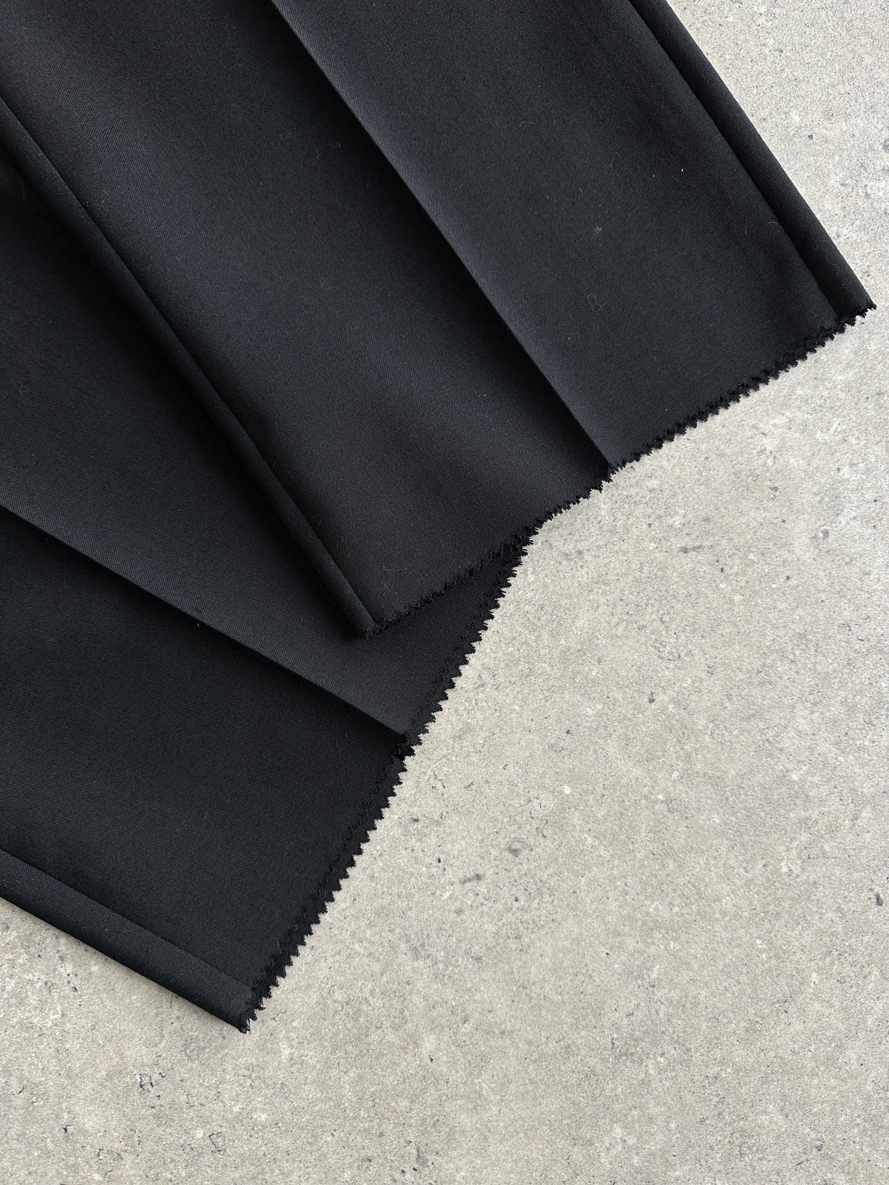 Italian Vintage pure wool straight-leg tailored trousers with raw hem, size W34, showcasing classic vintage style and high-quality fabric.