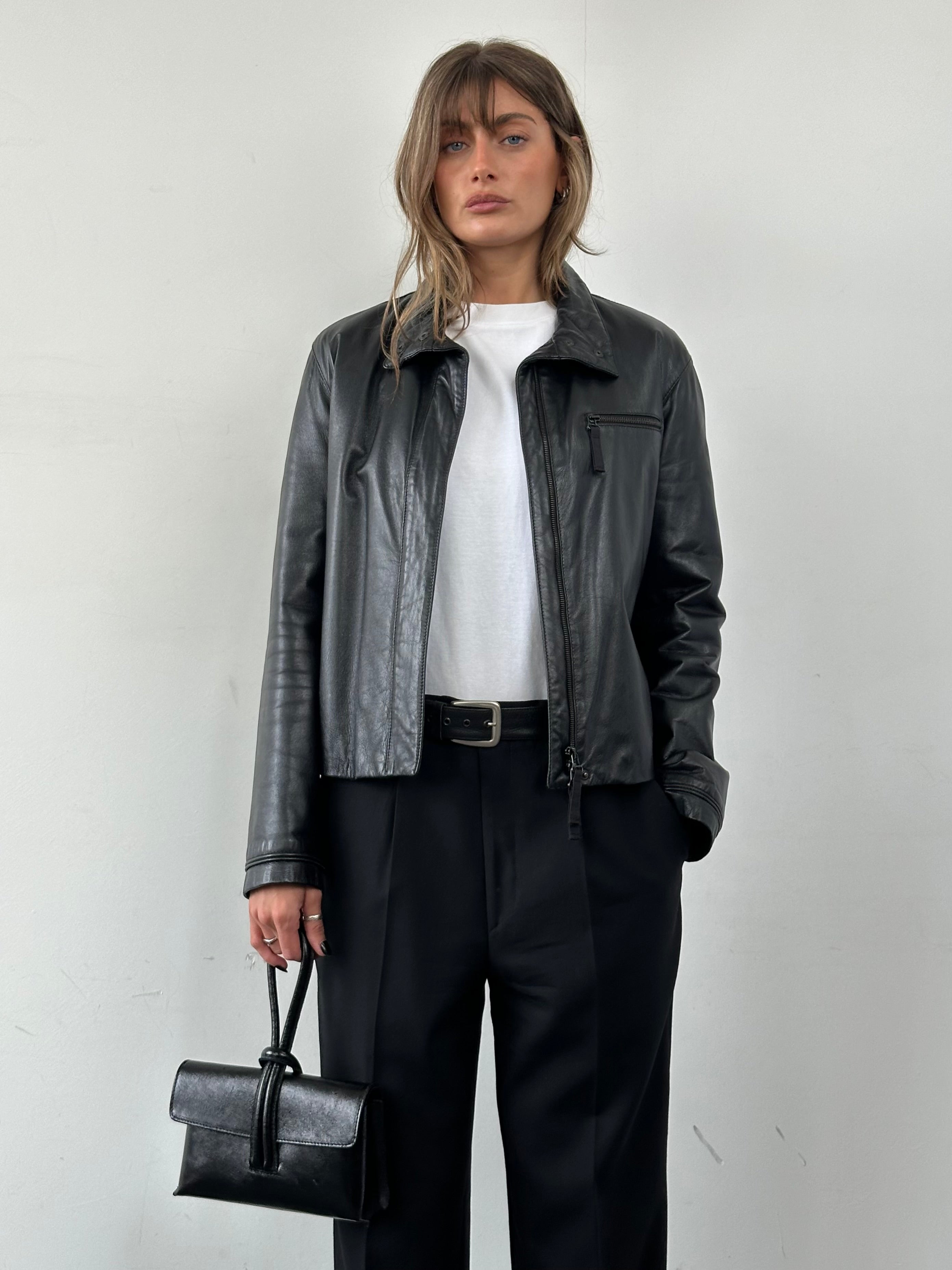 Armani Jeans black leather jacket with double zippers, featuring a classic fit and stylish design.