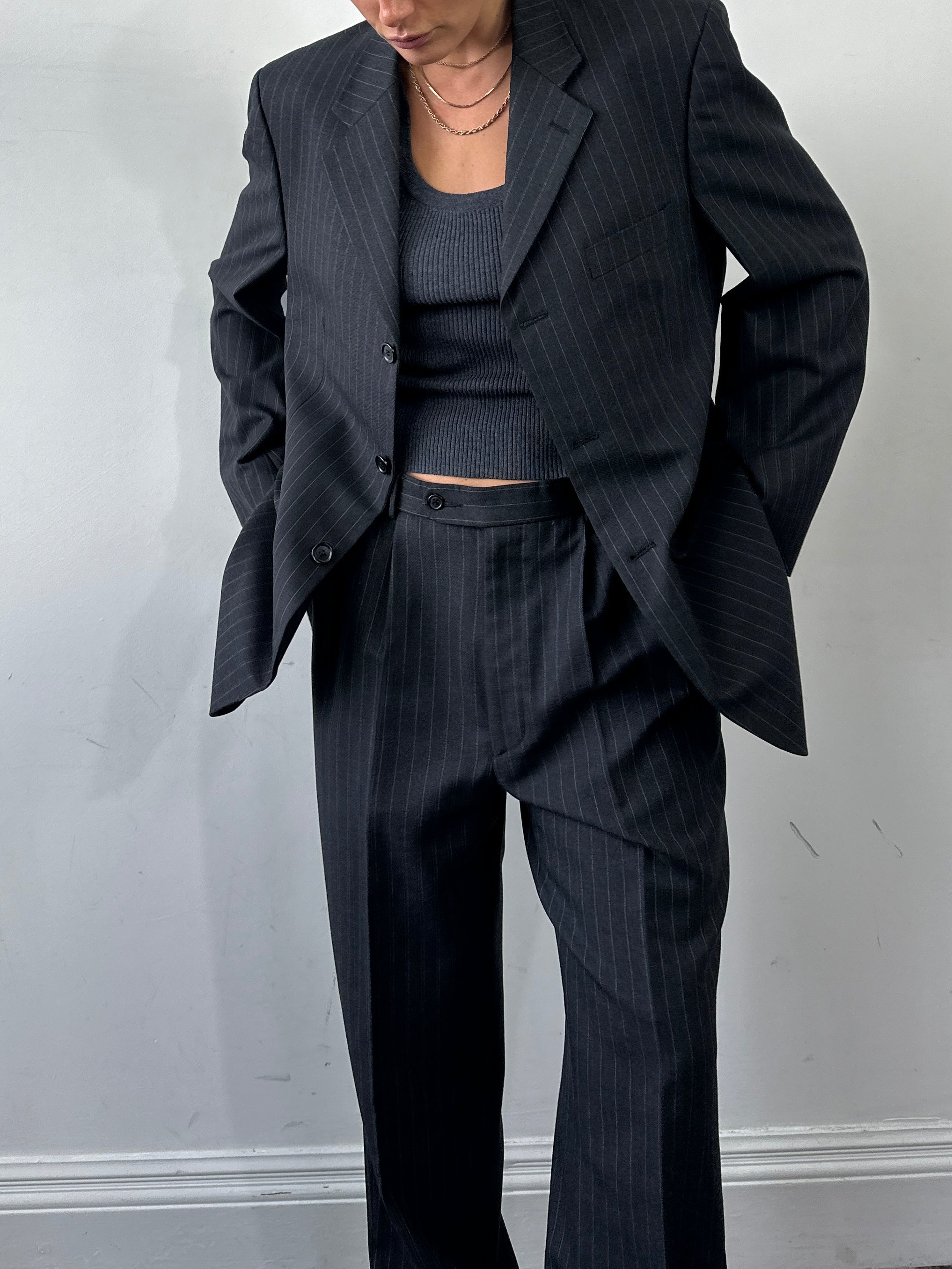 Pierre Cardin pinstripe pure wool single-breasted jumpsuit in size 40R/W32, featuring tailored lapels and a sleek fit.