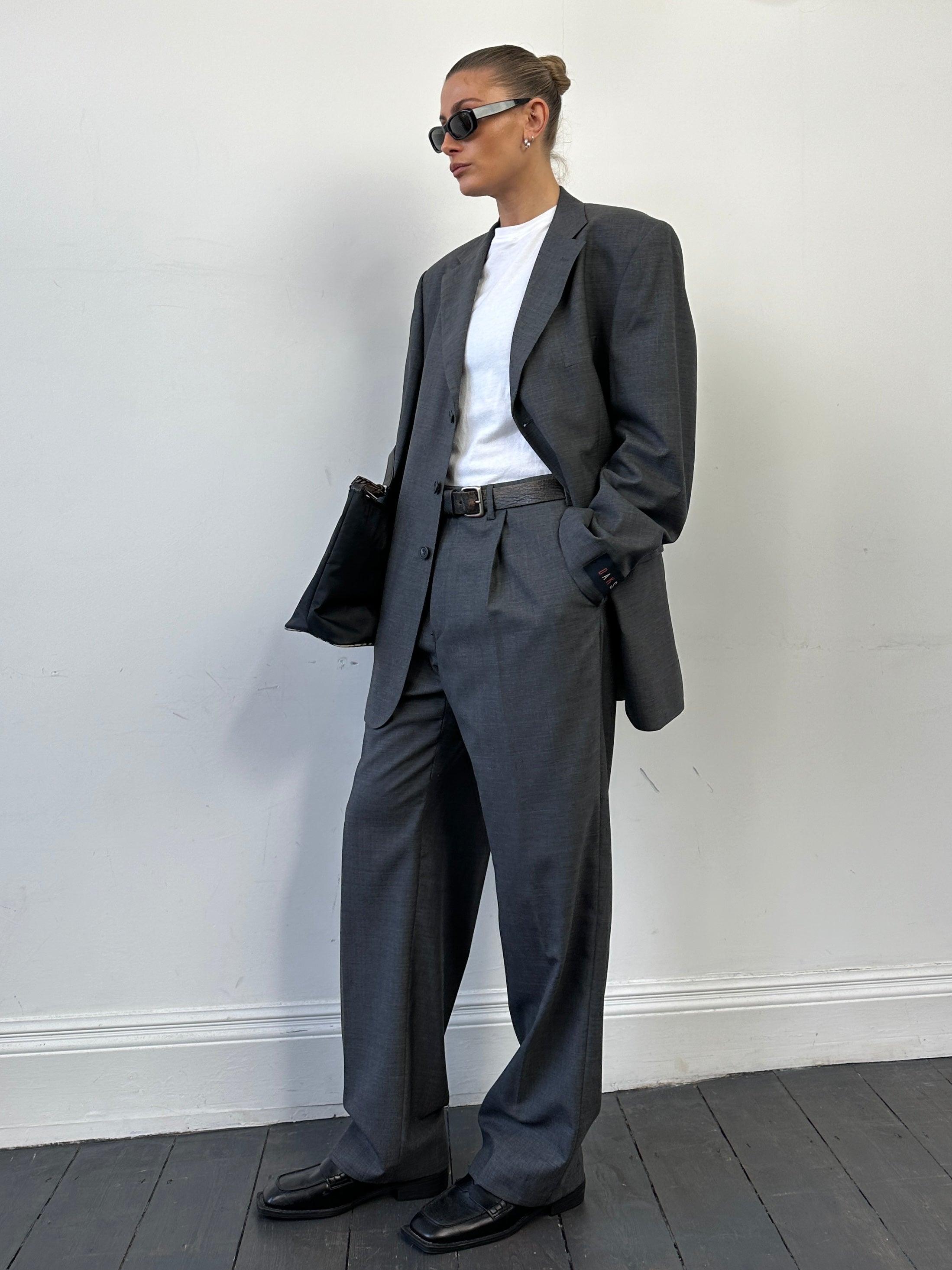 Vintage pure wool single-breasted suit jumpsuit in size 44R/W36, tailored with classic lapels and a structured fit.