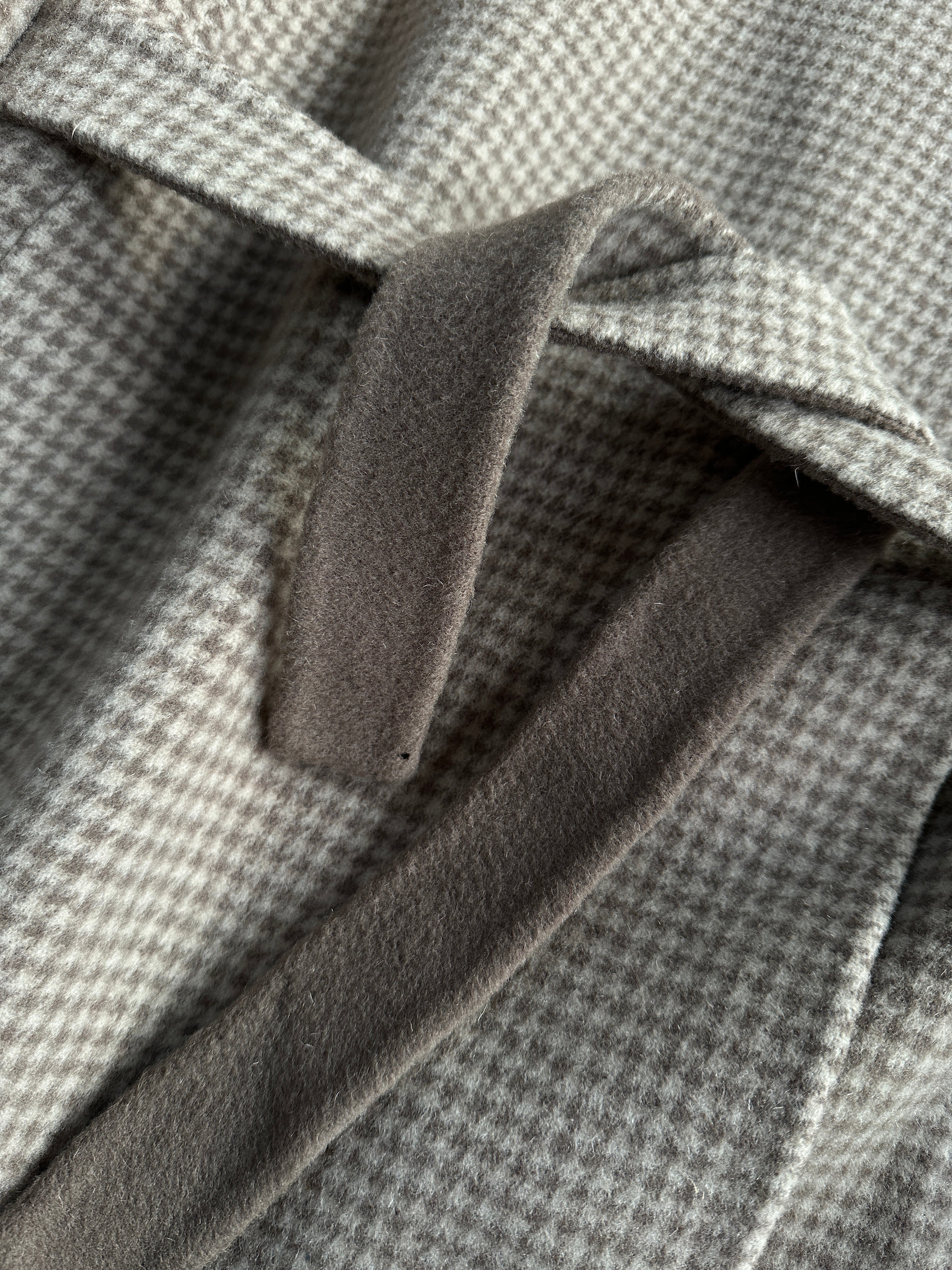Vintage Italian wool reversible belted coat, size M, showcasing its classic design and textured fabric in a detailed close-up image.