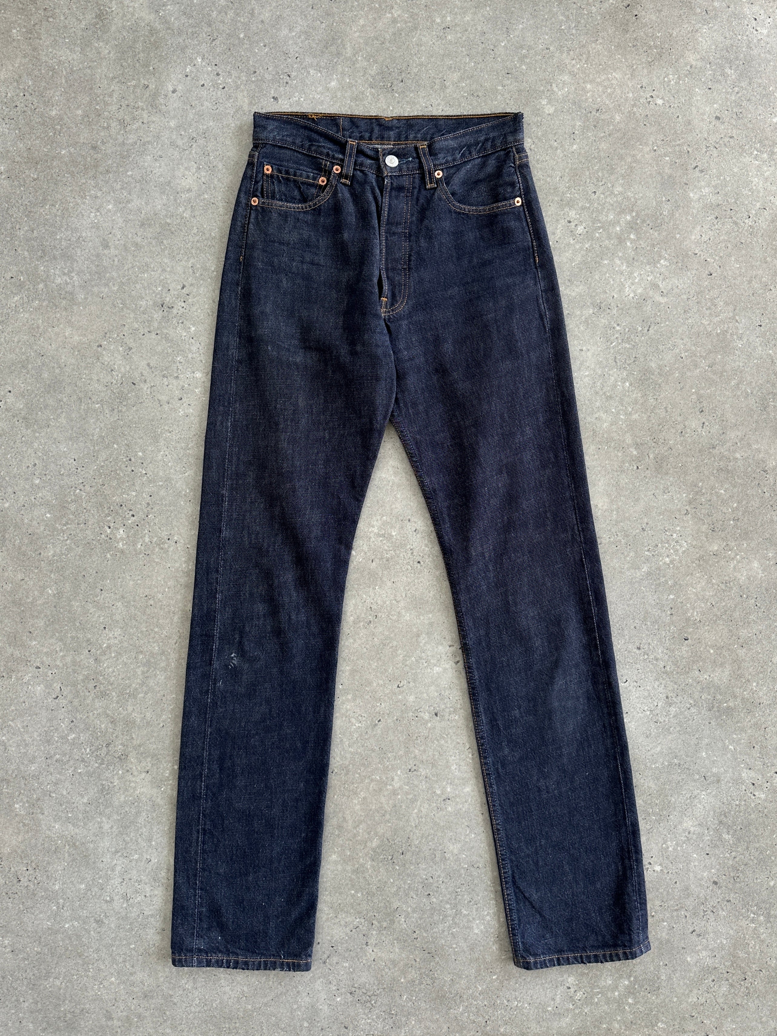 Levi’s 501 straight leg mid-waisted denim jeans in W26, showing classic blue denim fabric and five-pocket design.