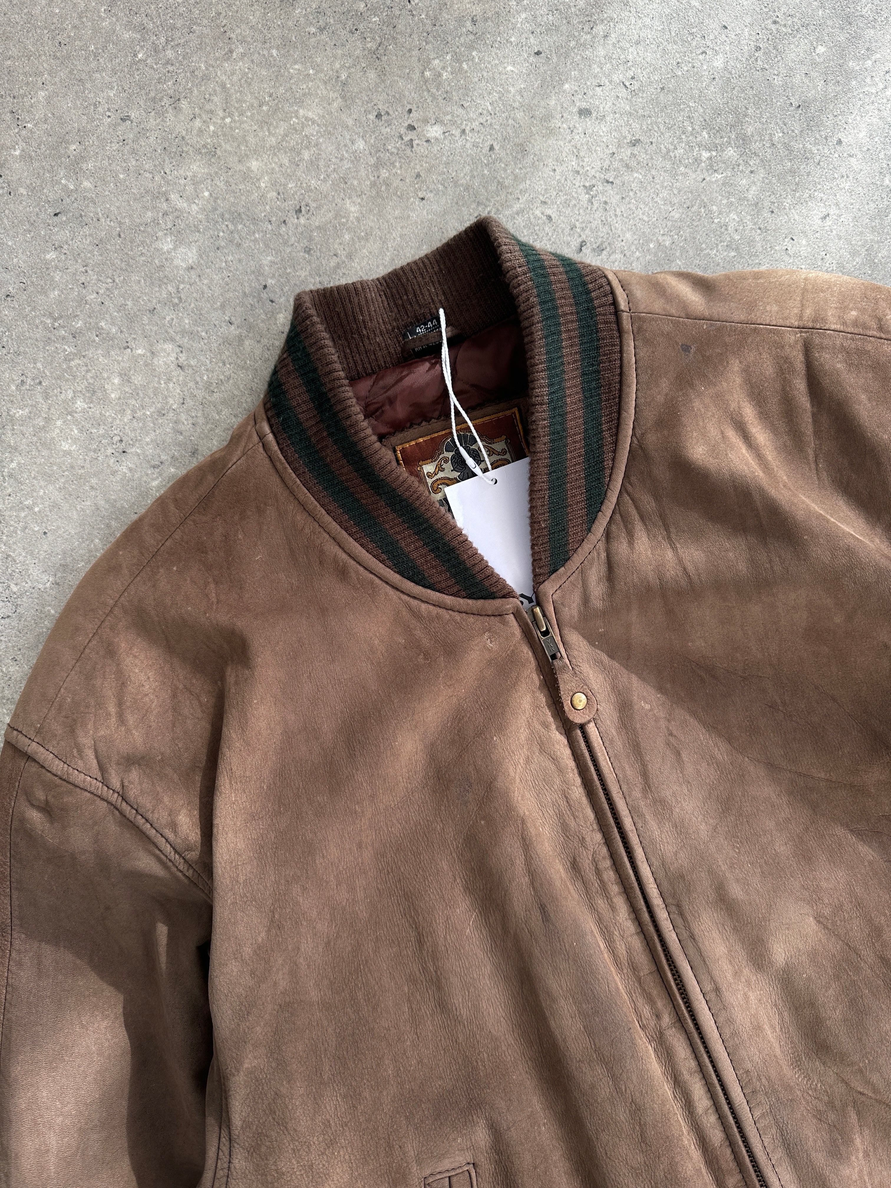 Vintage varsity nubuck leather bomber jacket in size M/L, featuring a classic design with ribbed cuffs and collar.