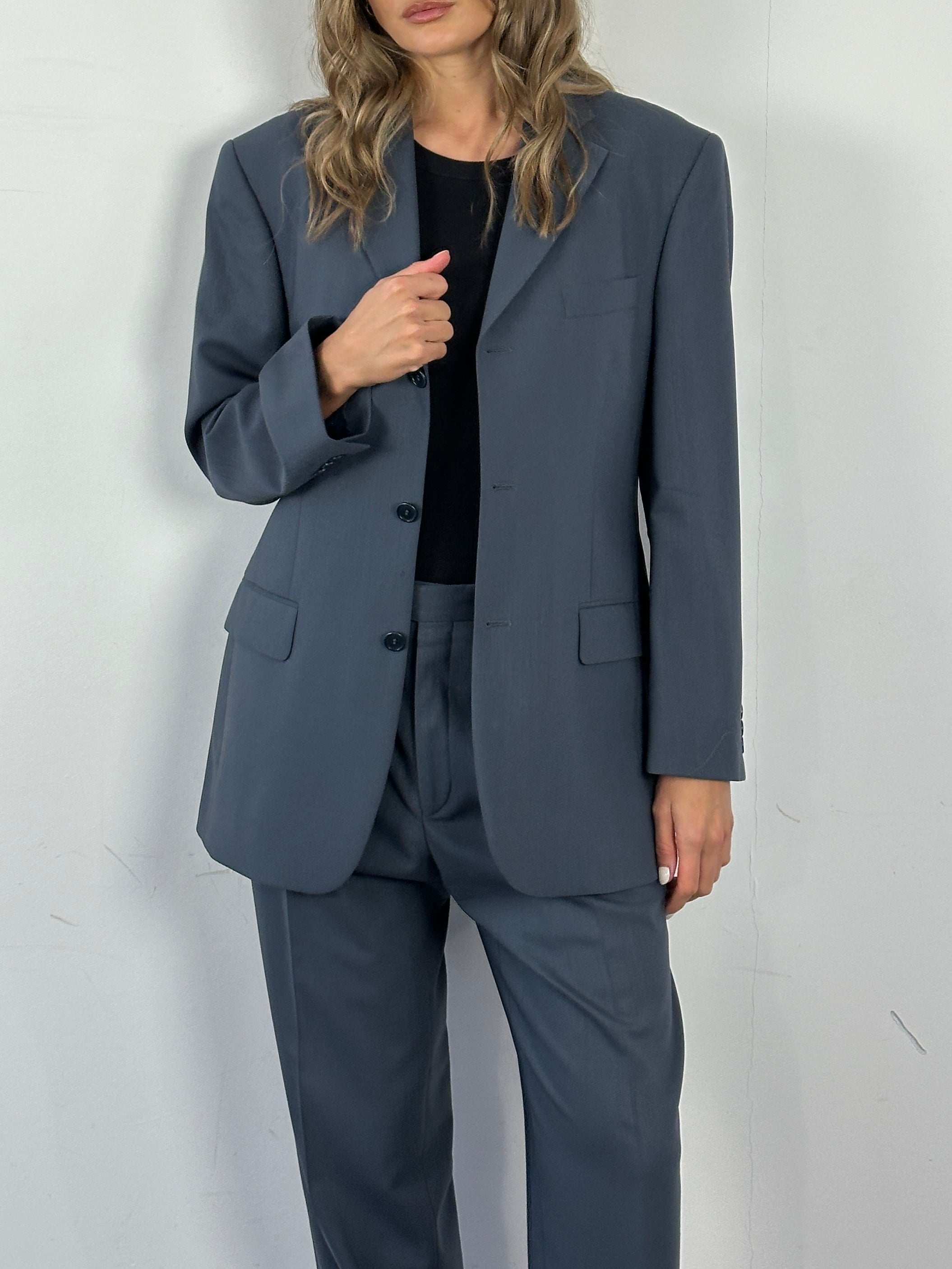 Balmain pure wool single-breasted jumpsuit in size 38S/W32, featuring tailored fit and classic design.