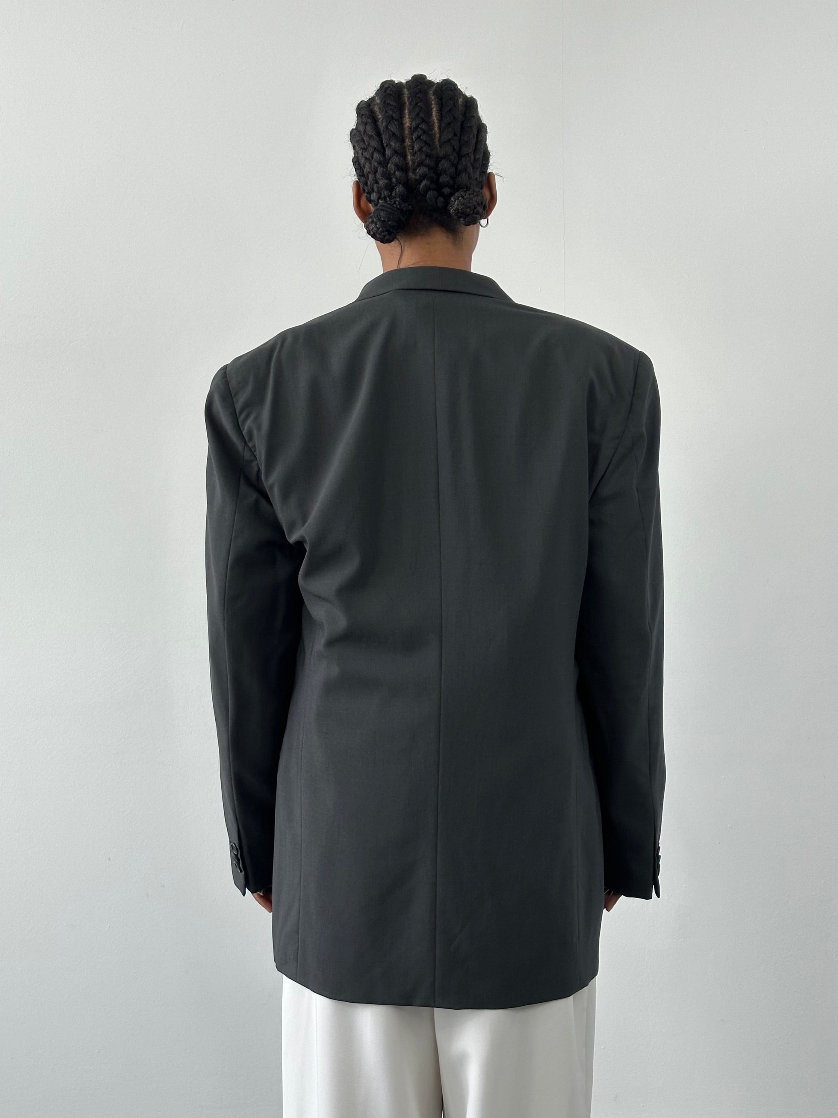 Giorgio Armani Le Collezioni 1990s wool single-breasted blazer in XL, navy blue with notch lapel and button closure.