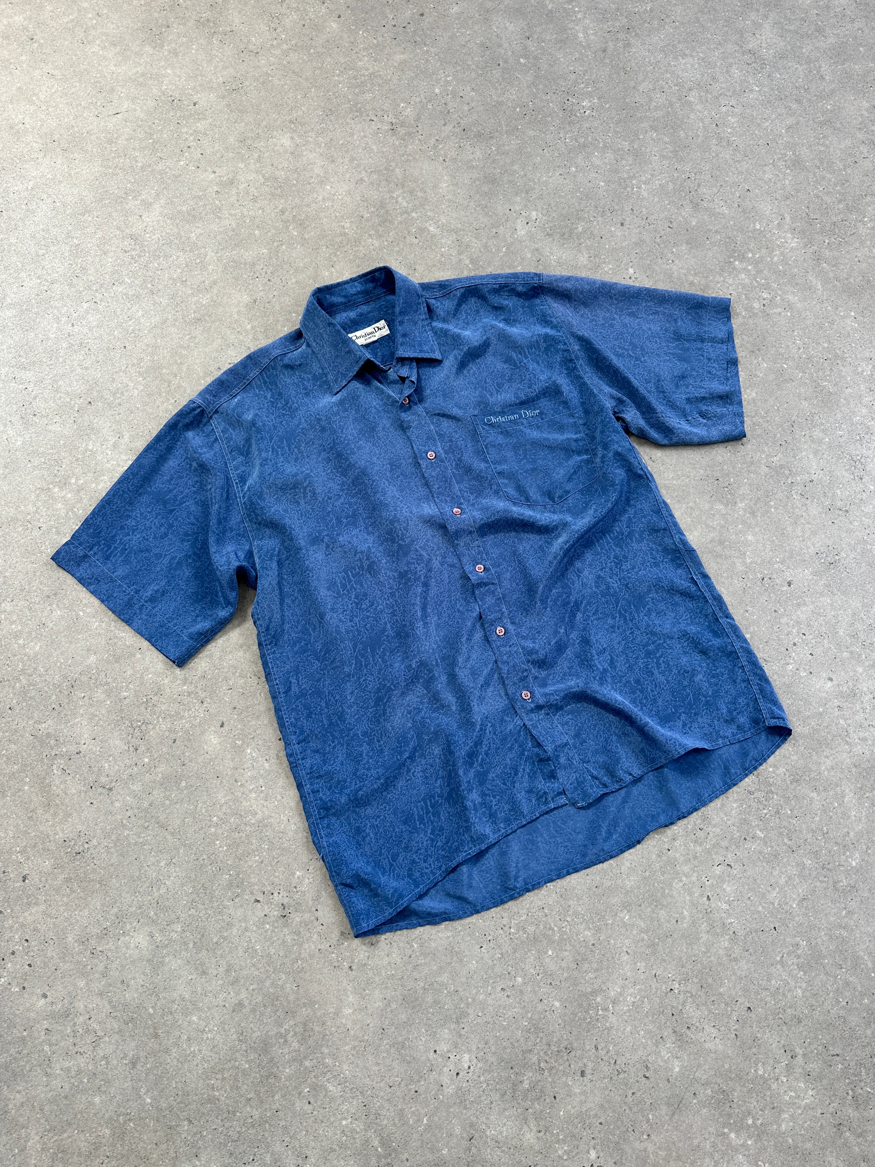 Christian Dior 90s silk print short sleeve logo shirt in XL, featuring vibrant patterns and classic Dior branding.