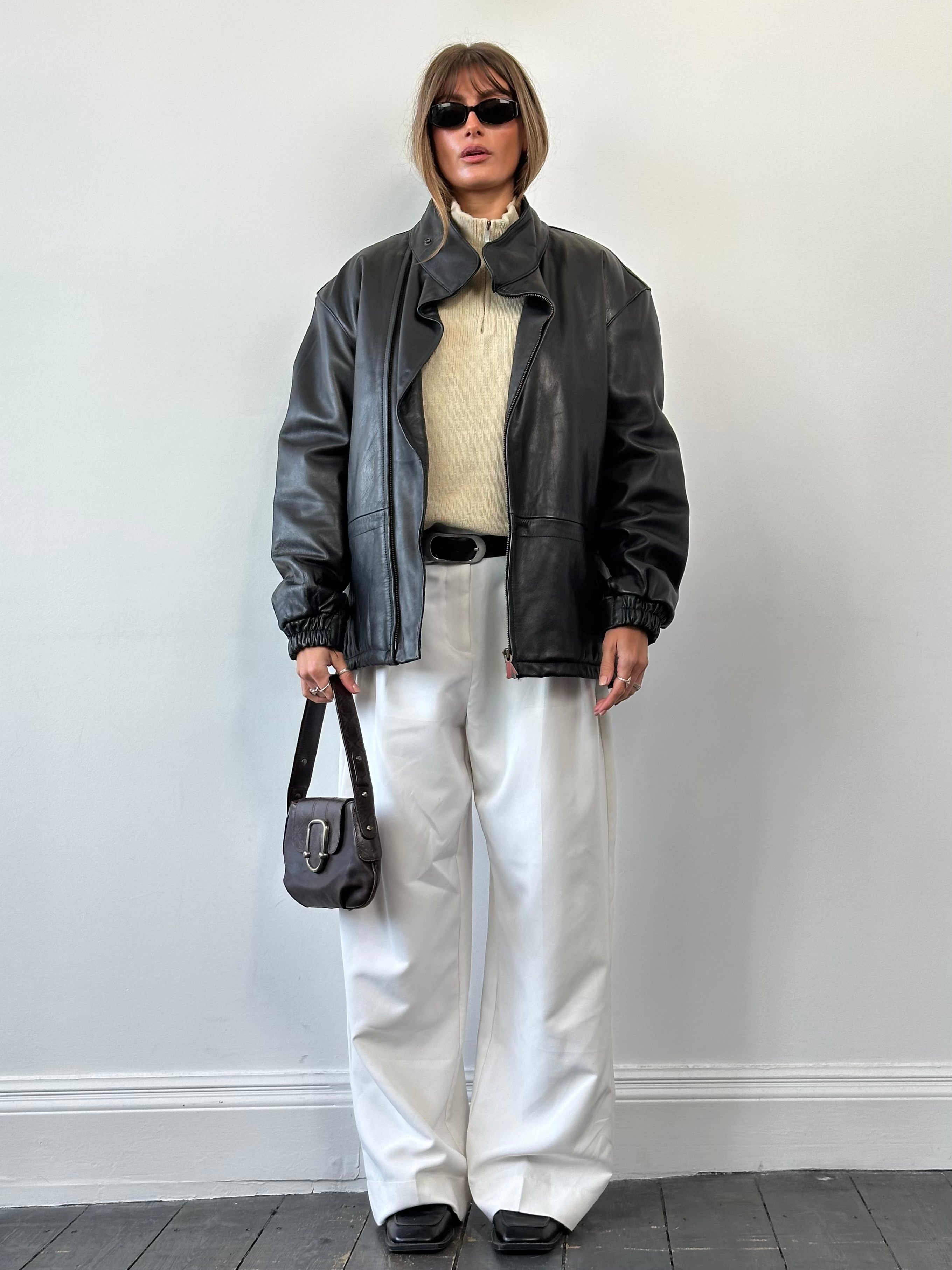 Vintage high neck leather jacket in smooth leather, size L/XL, featuring a classic vintage design with a sleek fit.