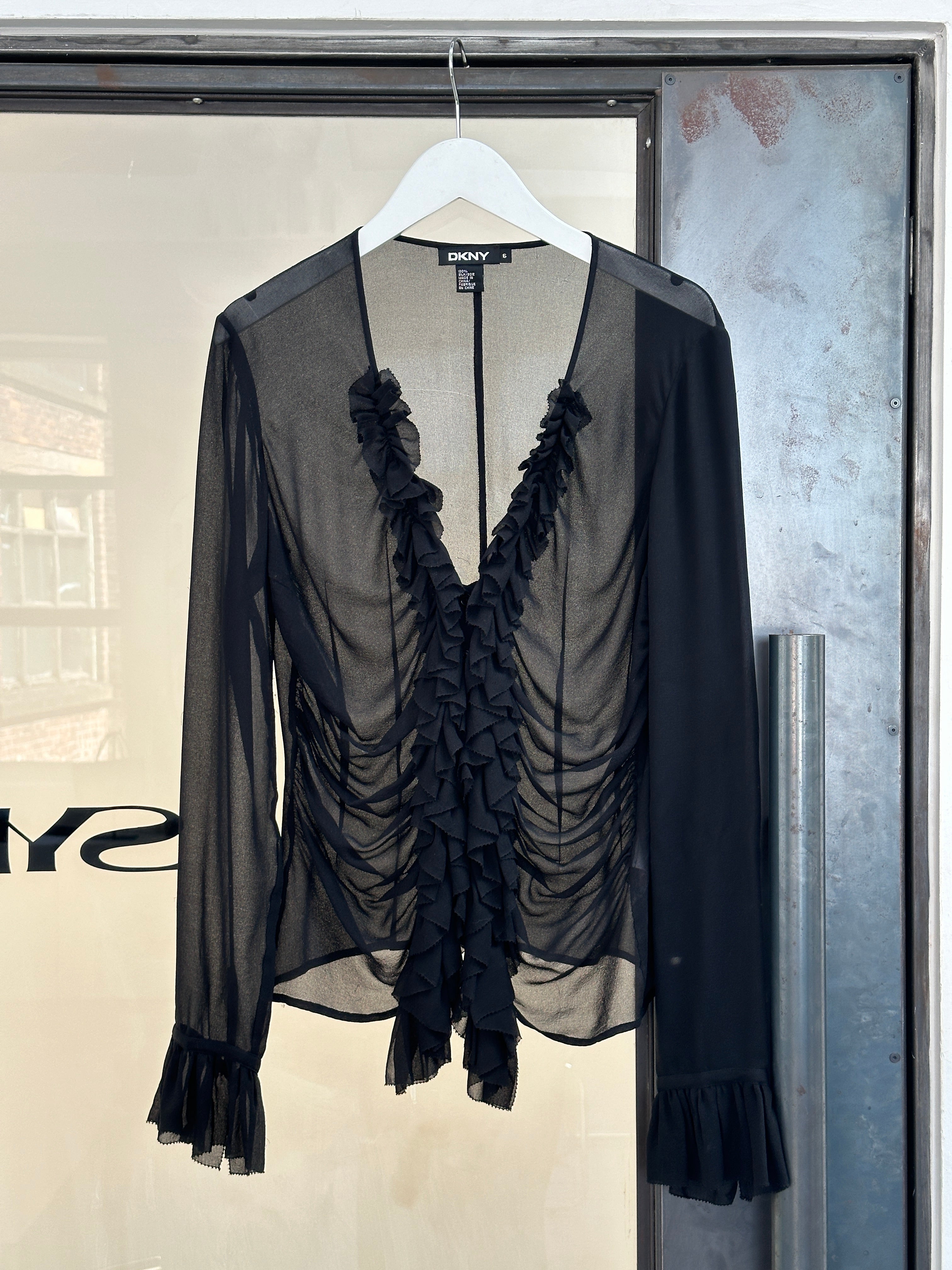 DKNY 2000s pure silk ruched shirt in size M, featuring a sleek fit and elegant design, displayed on a mannequin.