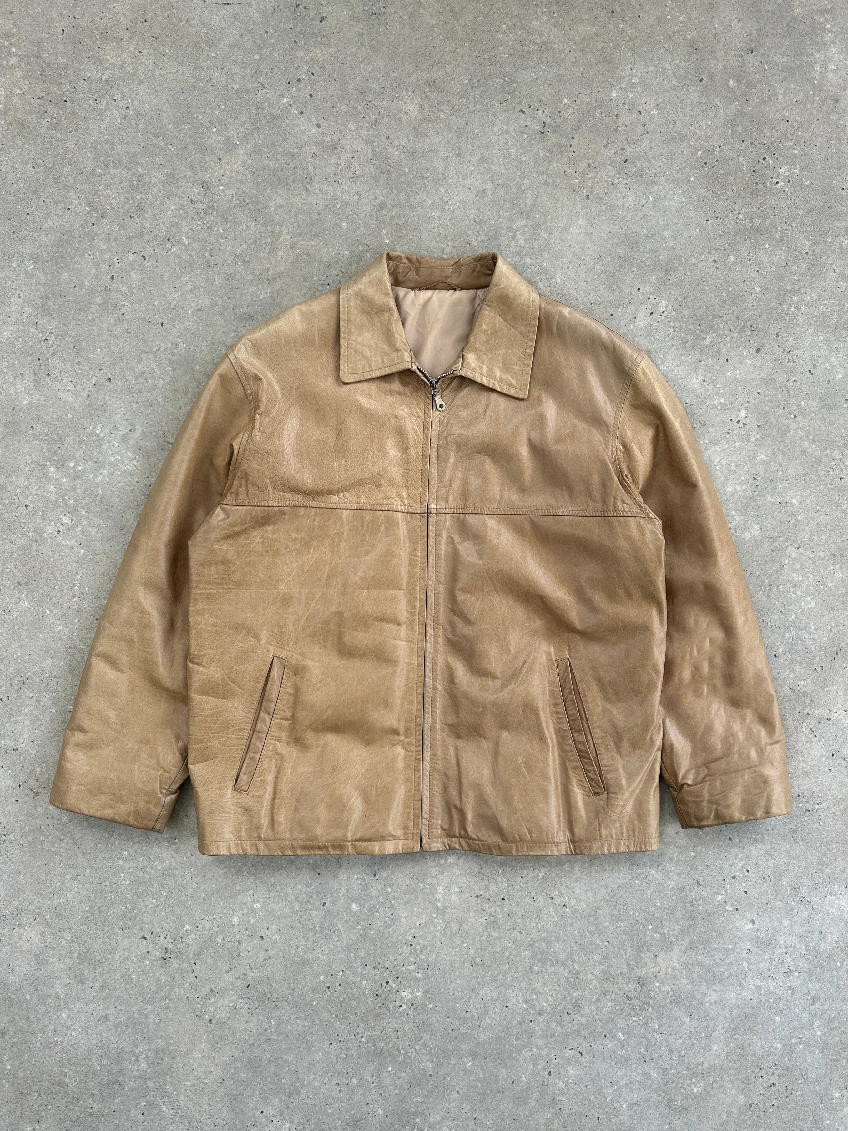 Vintage Italian vintage minimal leather jacket in size L, featuring sleek design and classic craftsmanship.