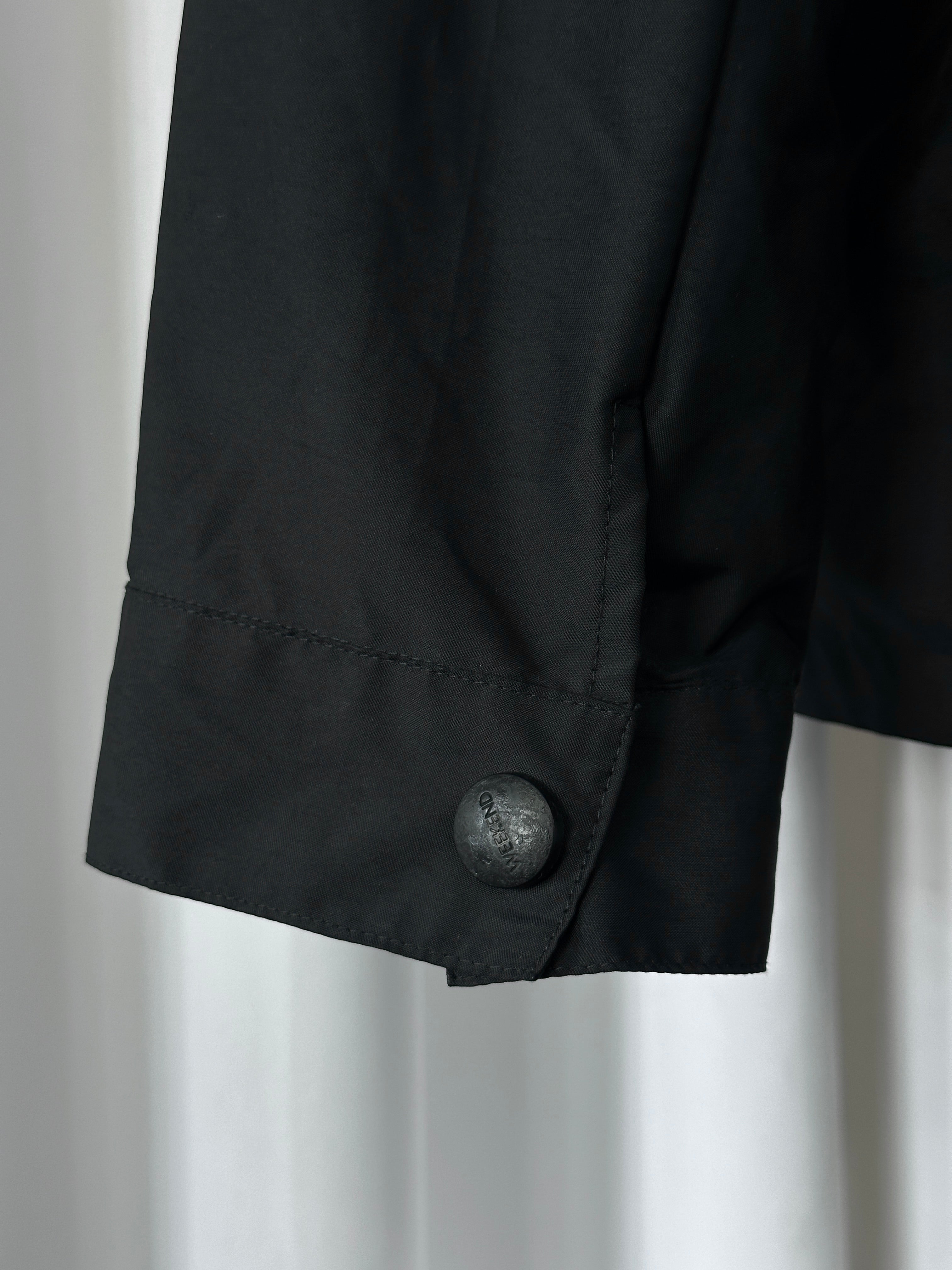 Max Mara Weekend 2000s style black bomber jacket with concealed placket and ribbed cuffs, size M, laid flat on a white background.