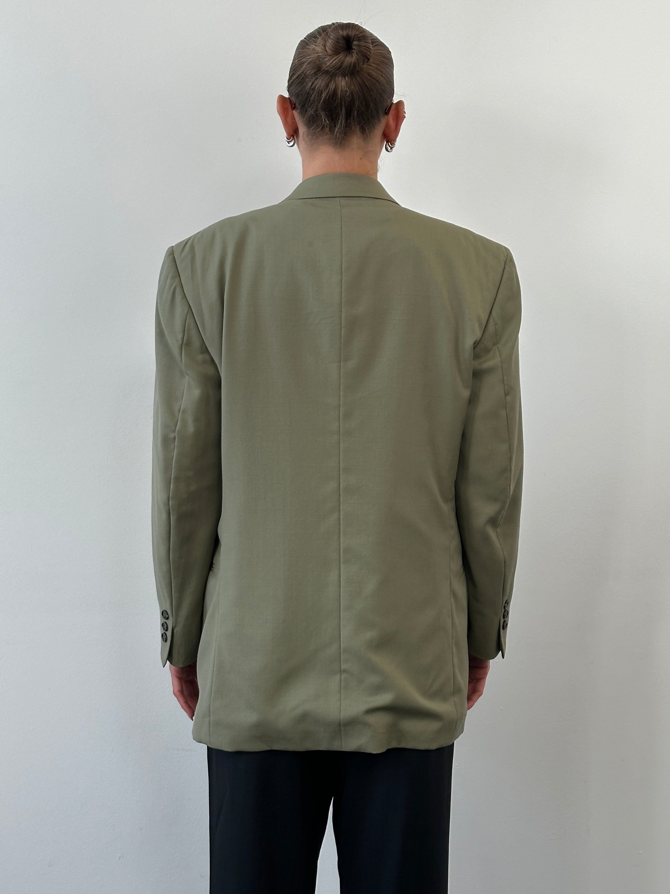 Yves Saint Laurent 1980s pure wool double-breasted blazer in size 40R/L, classic tailored design in neutral color