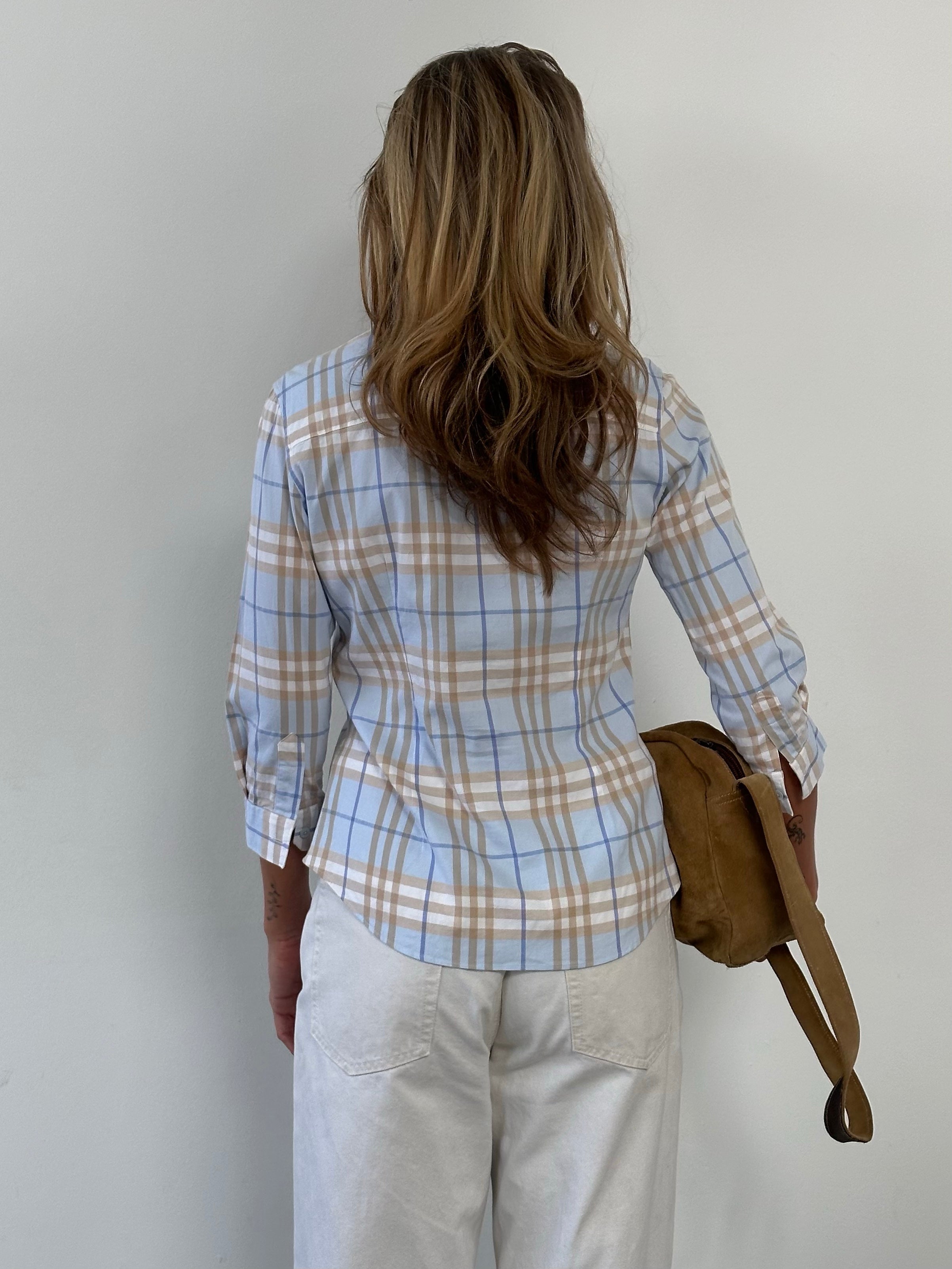 Burberry London 2000s cotton check shirt in size S, featuring classic beige and black plaid pattern, button-up front, and collar.
