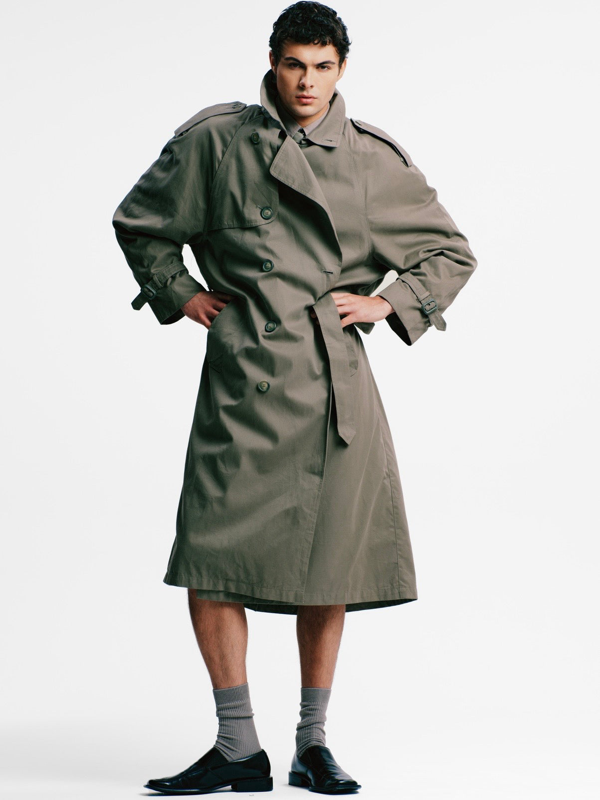 London Fog 1980s cotton belted trench coat in XL, showing classic beige design, double-breasted style, and waist belt detail.