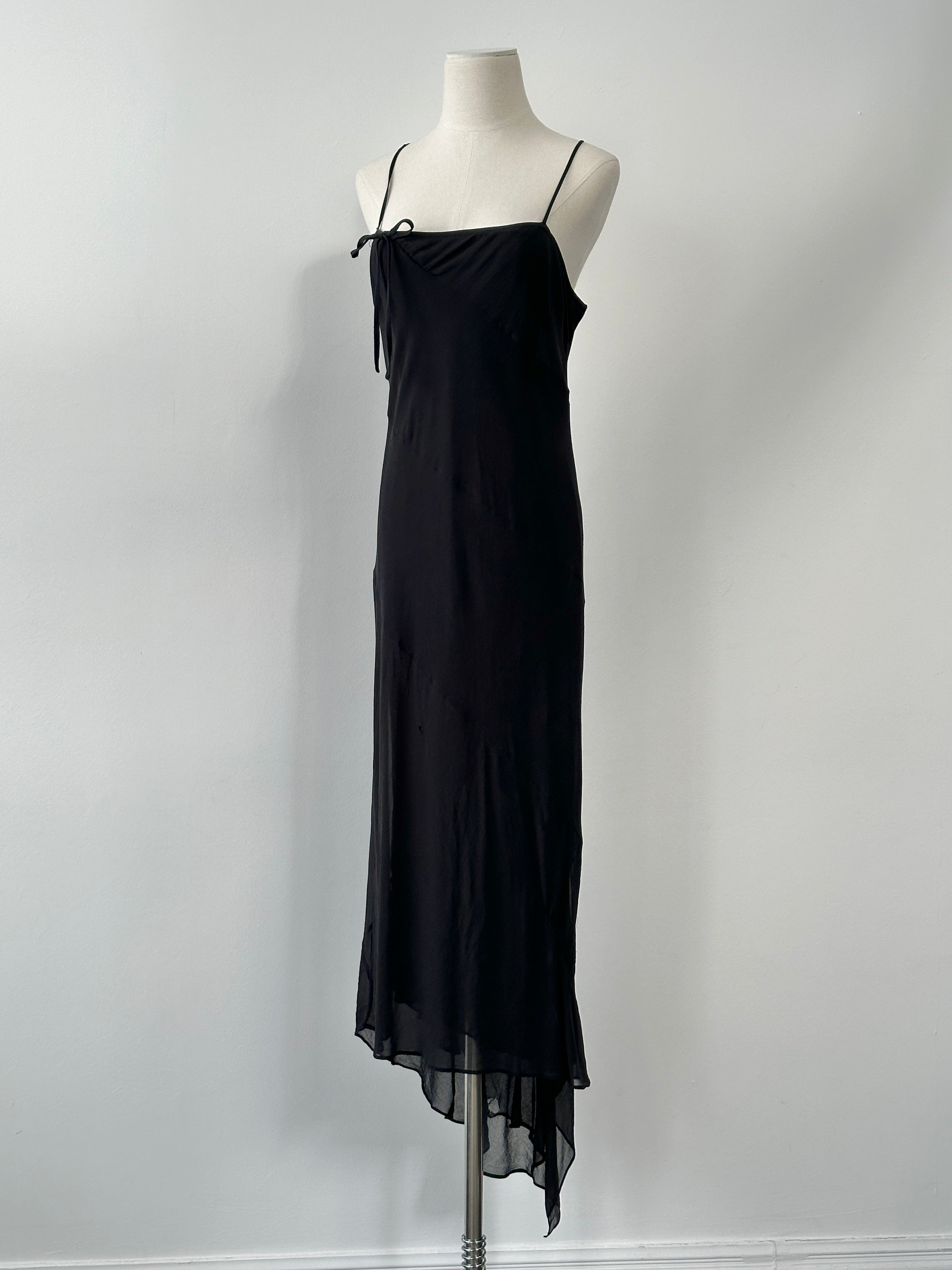Vintage 2000s pure silk floor-length dress in size M-L, elegant and flowing with intricate details and a classic silhouette.