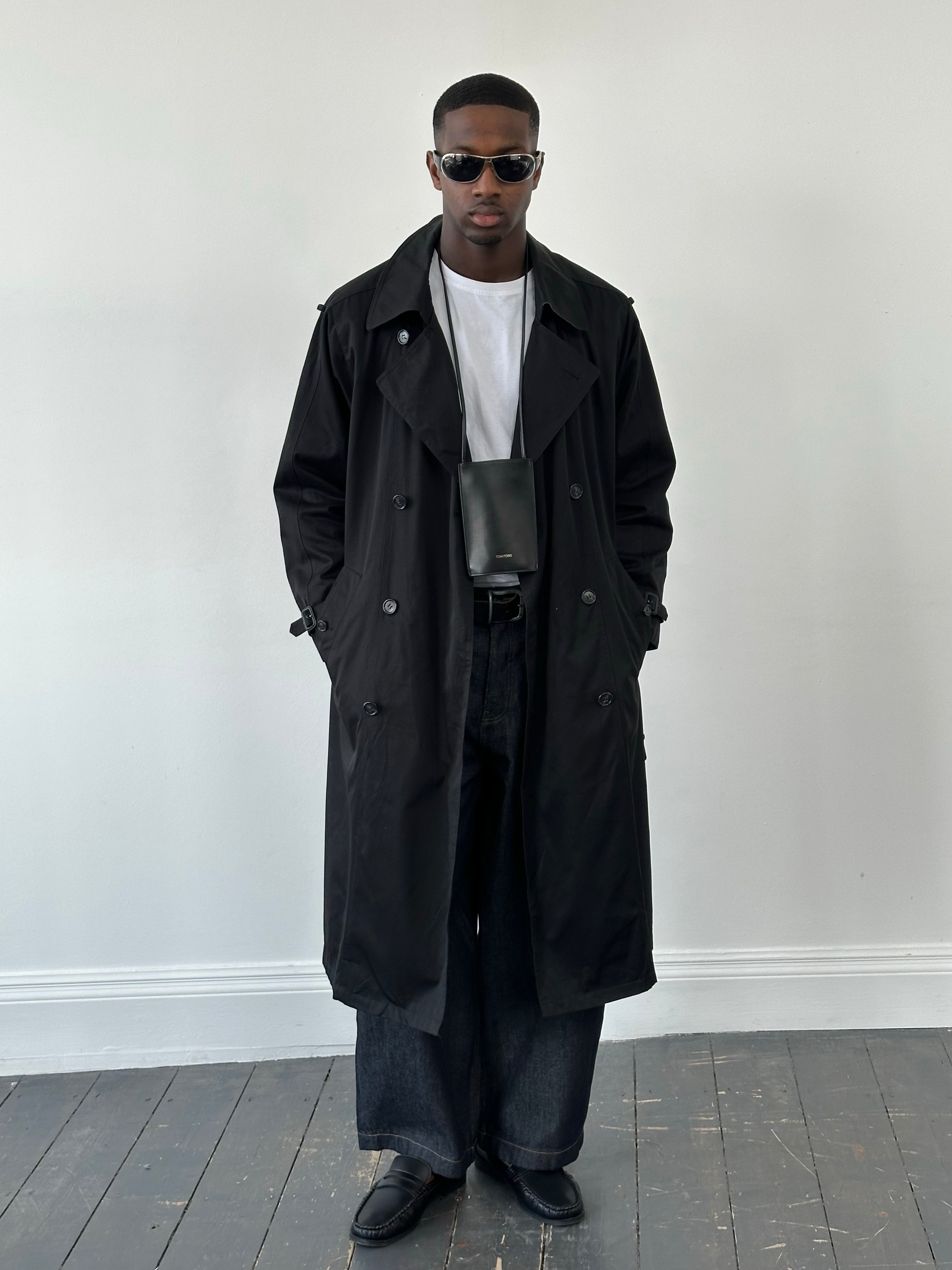 London Fog Towne 1990s double-breasted belted trench coat, classic beige coat with wide lapels and waist belt, front view.