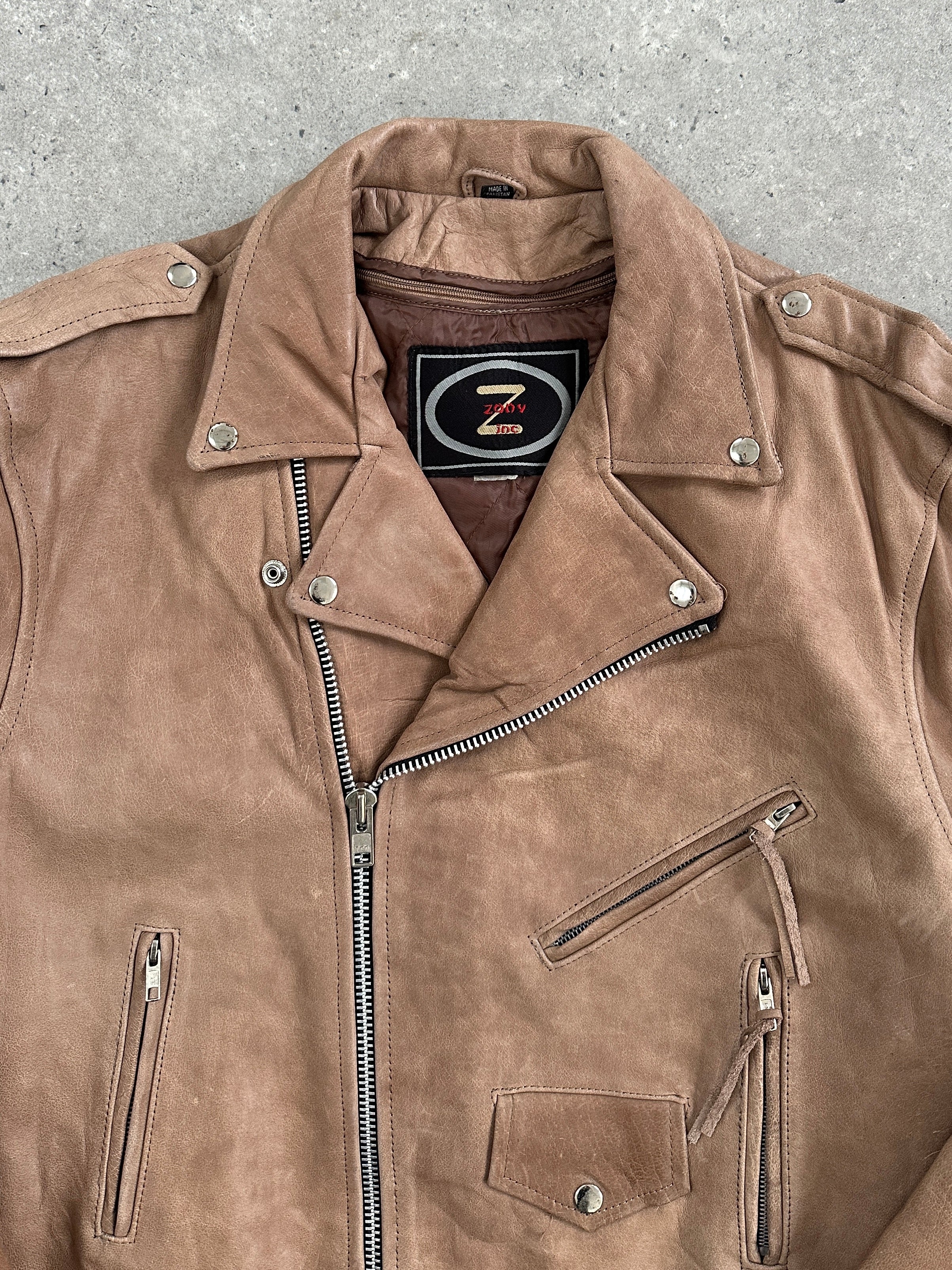 Vintage 1990s leather biker jacket in XL size, rugged and stylish with classic motorcycle design and aged leather texture.