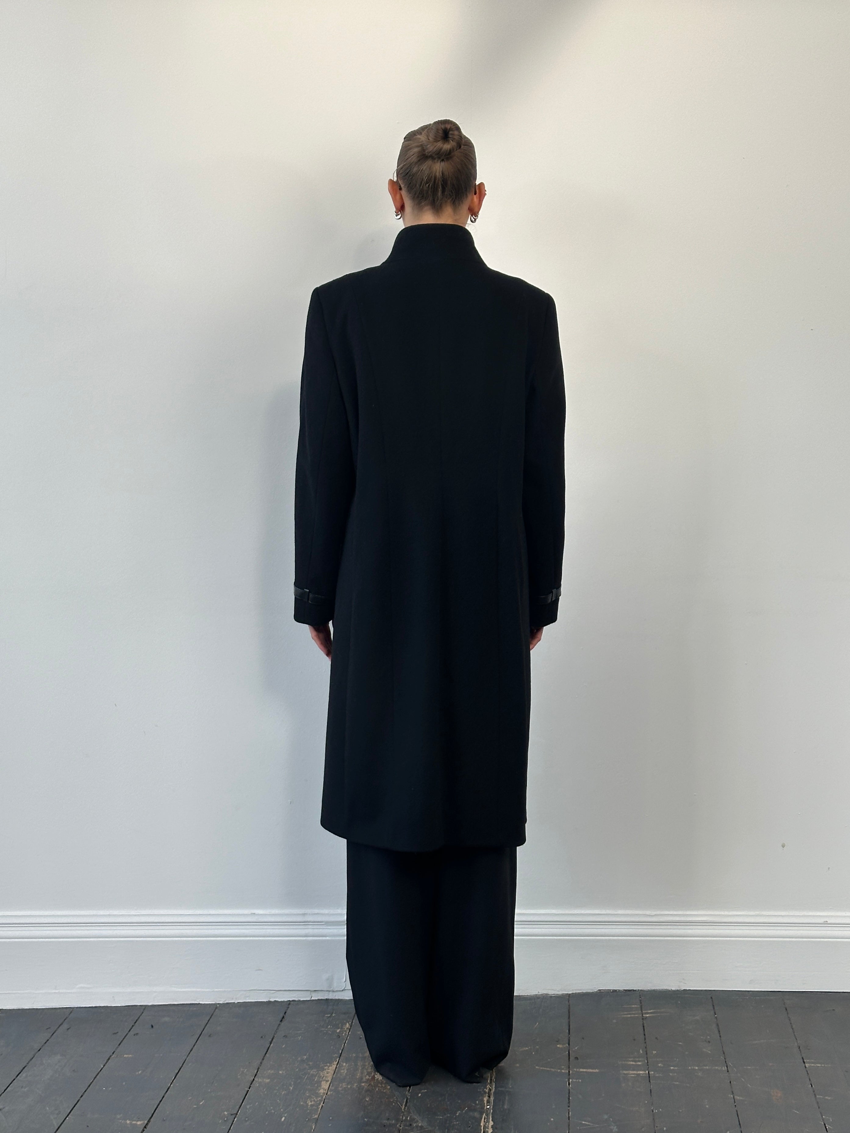 Vintage 1990s wool high neck coat in size large, showcasing a classic design with a high collar and textured fabric.