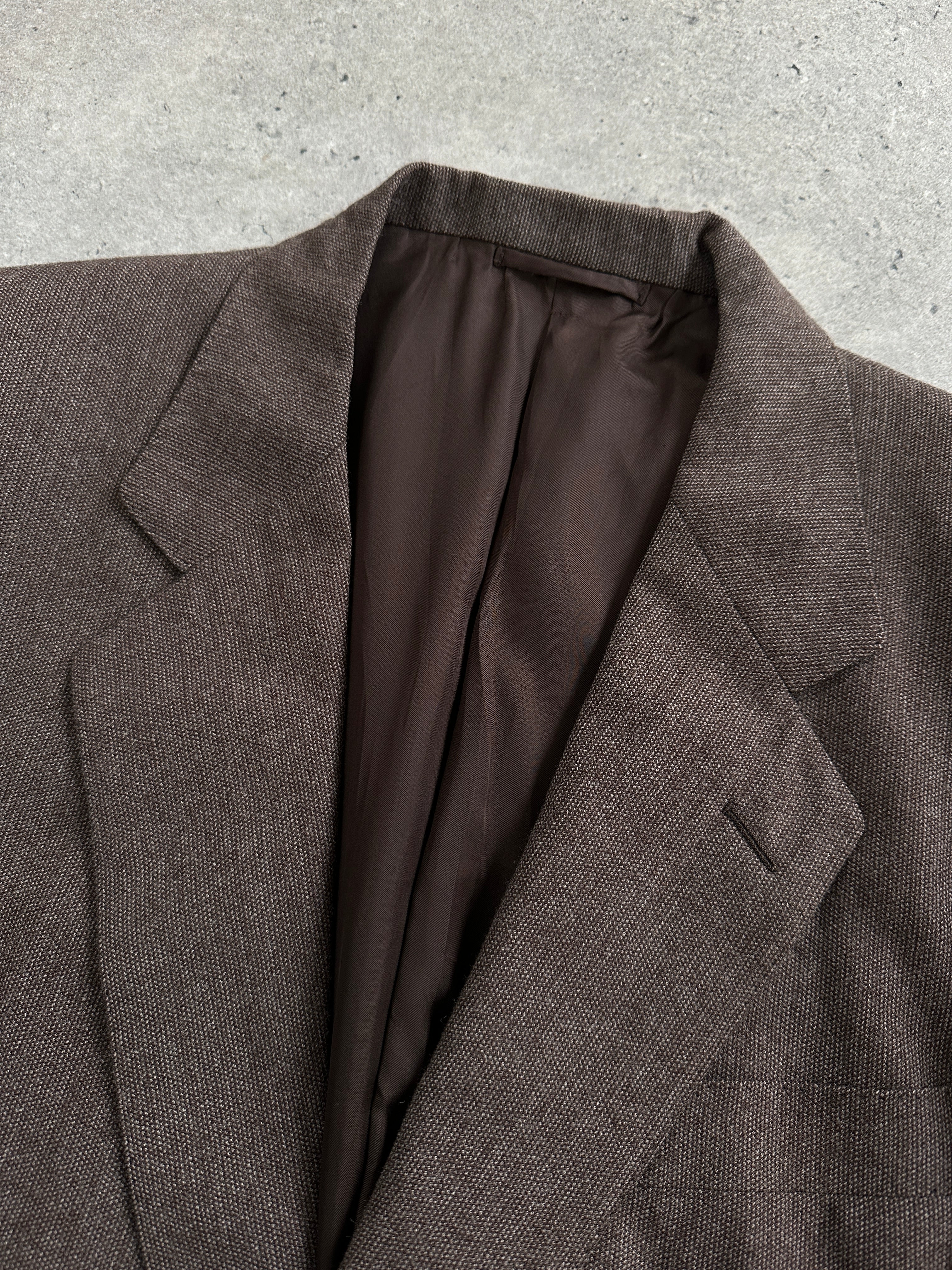 Burberry 1990s pure wool single-breasted blazer in size 42R/L, classic tailored design with check pattern details.