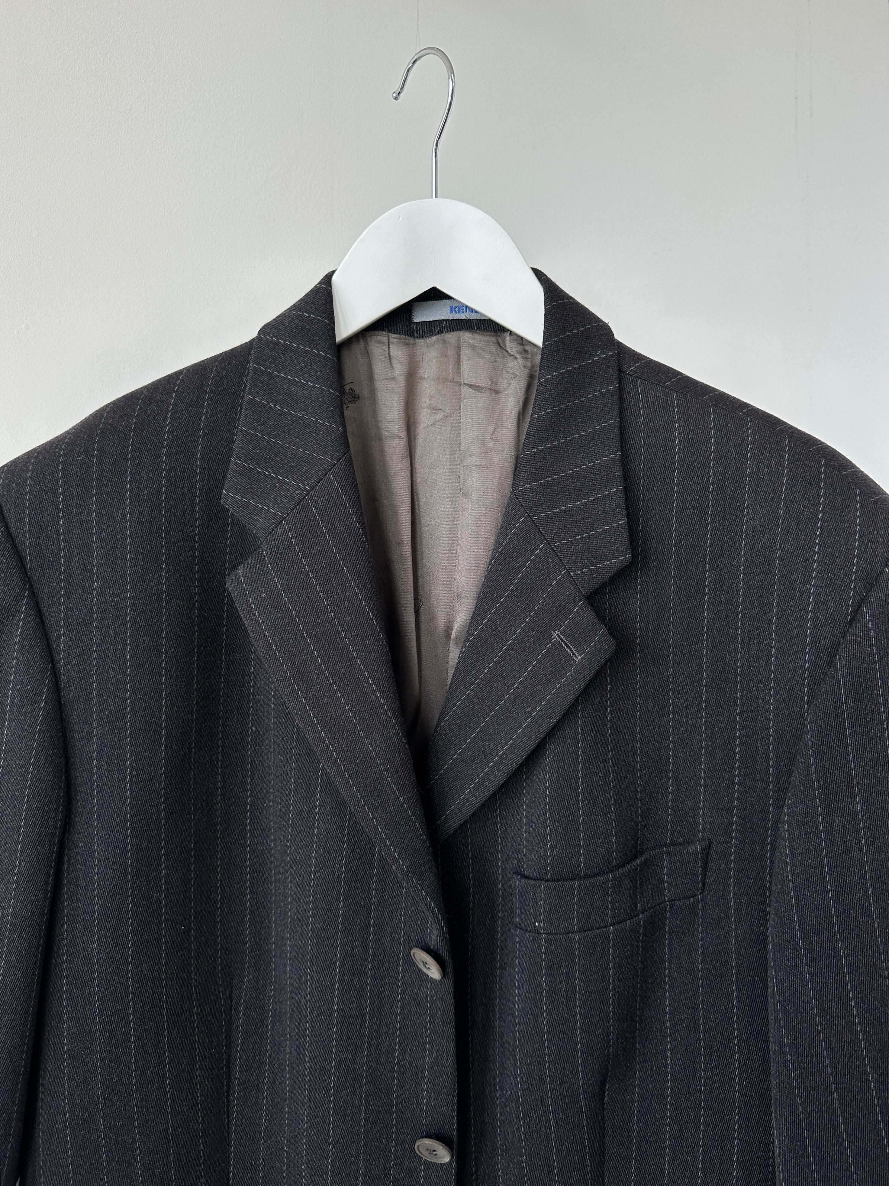 Kenzo wool pinstripe single-breasted blazer in size 44R, featuring classic lapels and tailored fit, displayed on a mannequin.