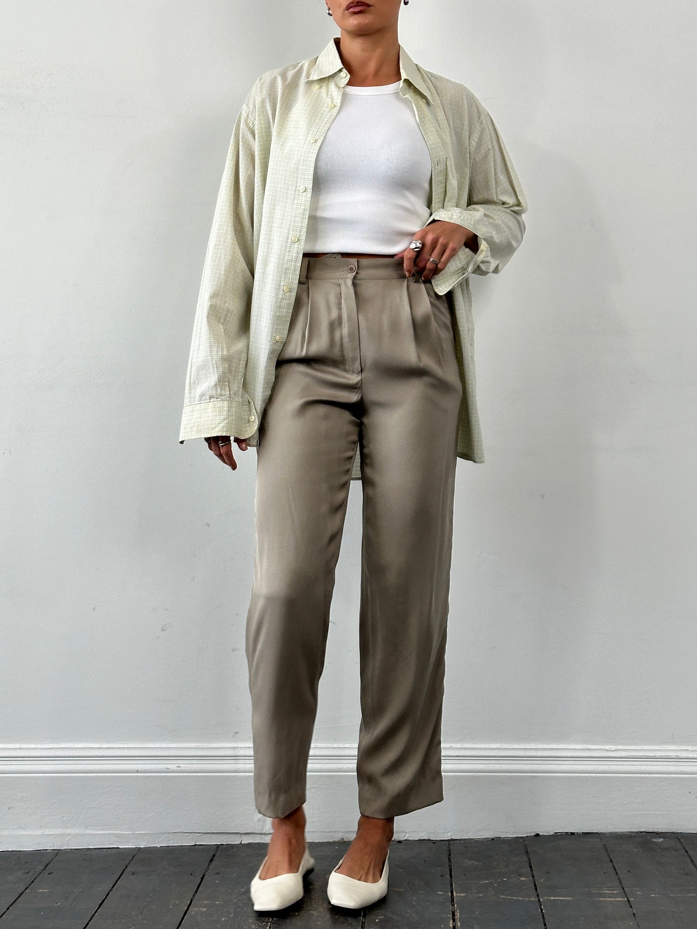 Mani Pure Silk High Waisted Trousers in size W26, showcasing smooth silk fabric and tailored fit with a high waist design.