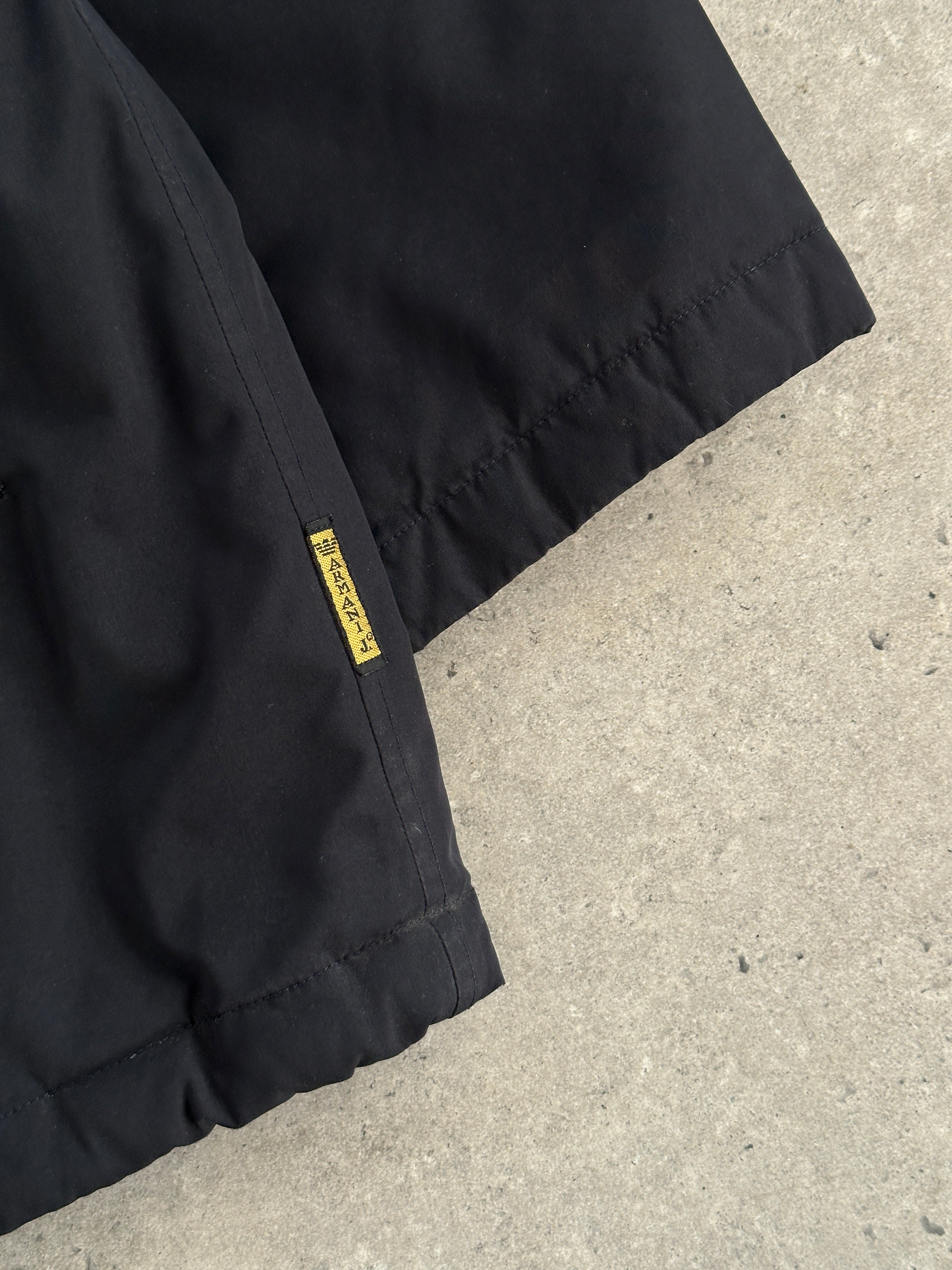 Armani Jeans padded hooded jacket in size XL/XXL, black quilted jacket with front zipper and adjustable hood.