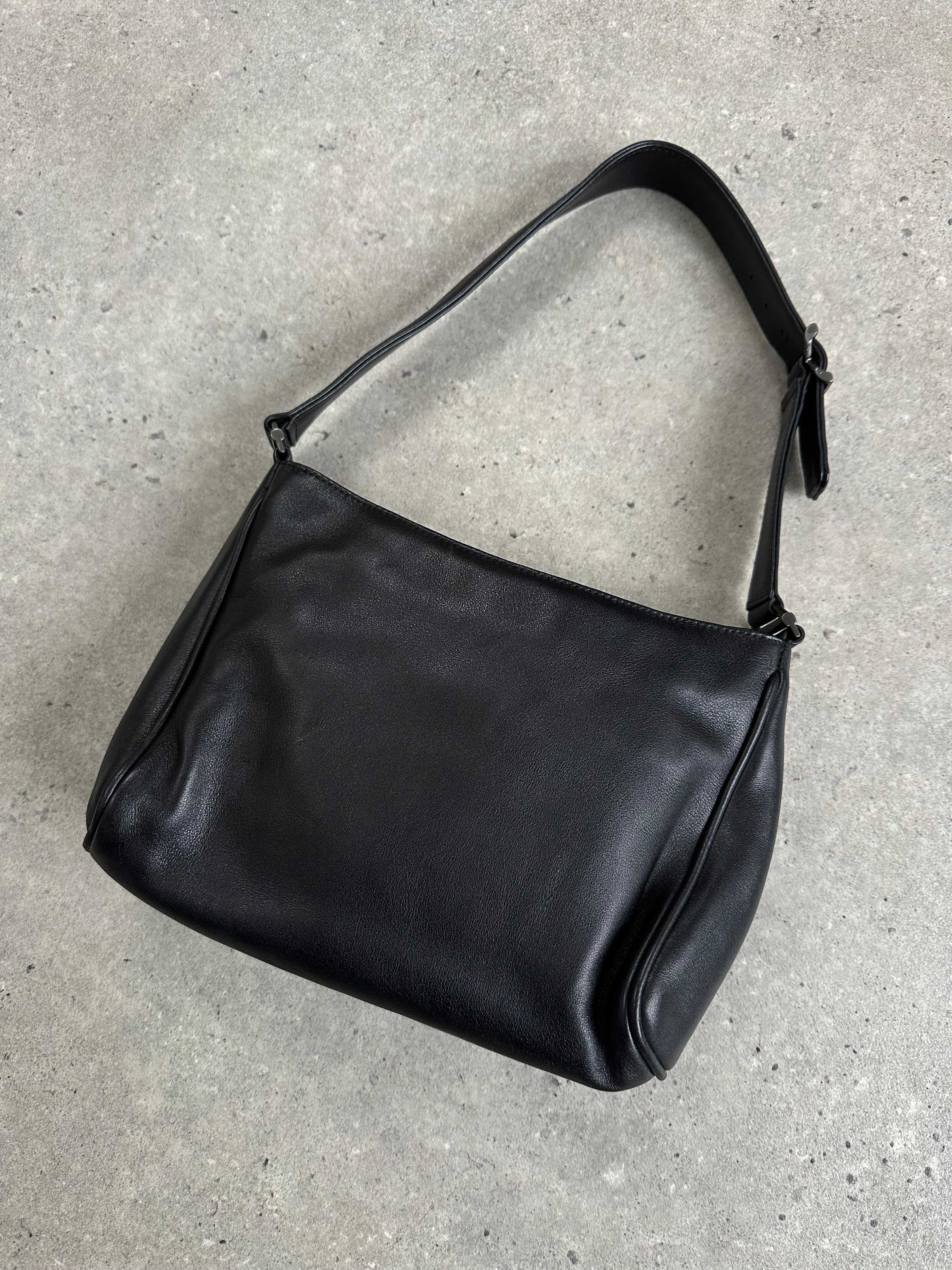 Giorgio Armani 2000s leather shoulder bag with sleek design, featuring a structured silhouette and elegant hardware details.