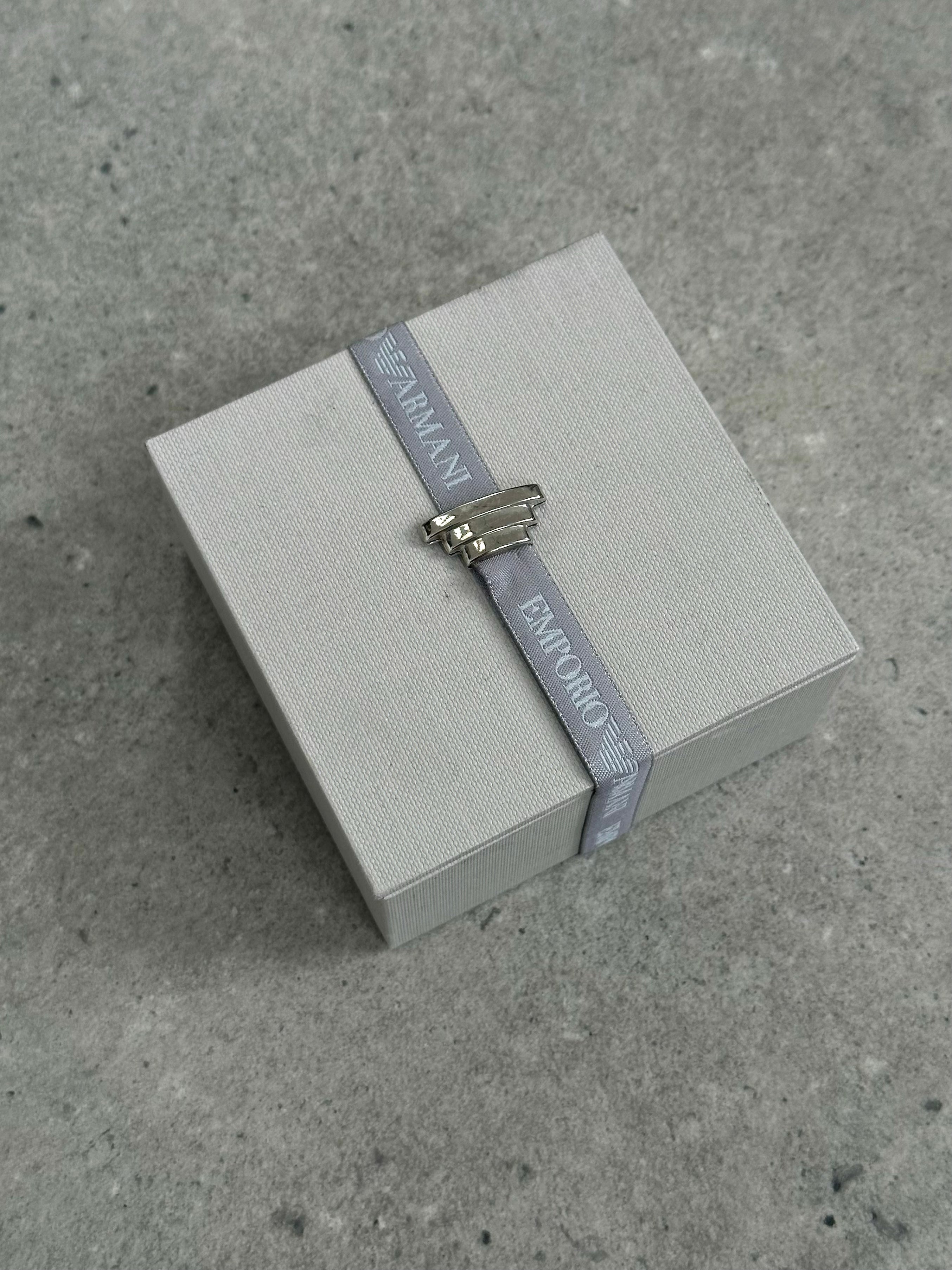 Emporio Armani 2000s leather necklace with glass pendant, stylish jewelry featuring a sleek leather strap and clear glass charm.
