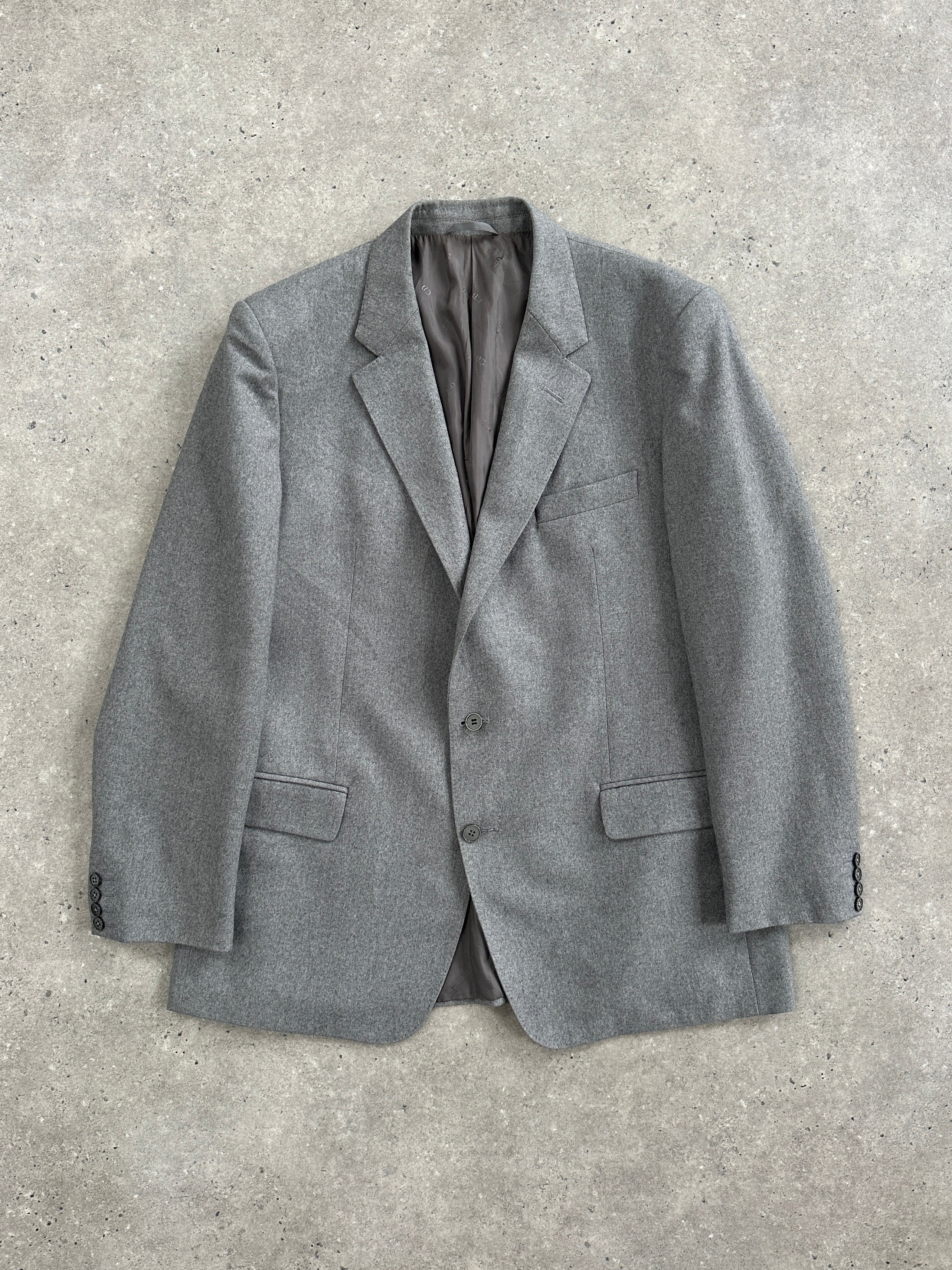 Christian Dior Monsieur 1990s brushed wool single-breasted blazer in size 44R/XL, displayed on a hanger.