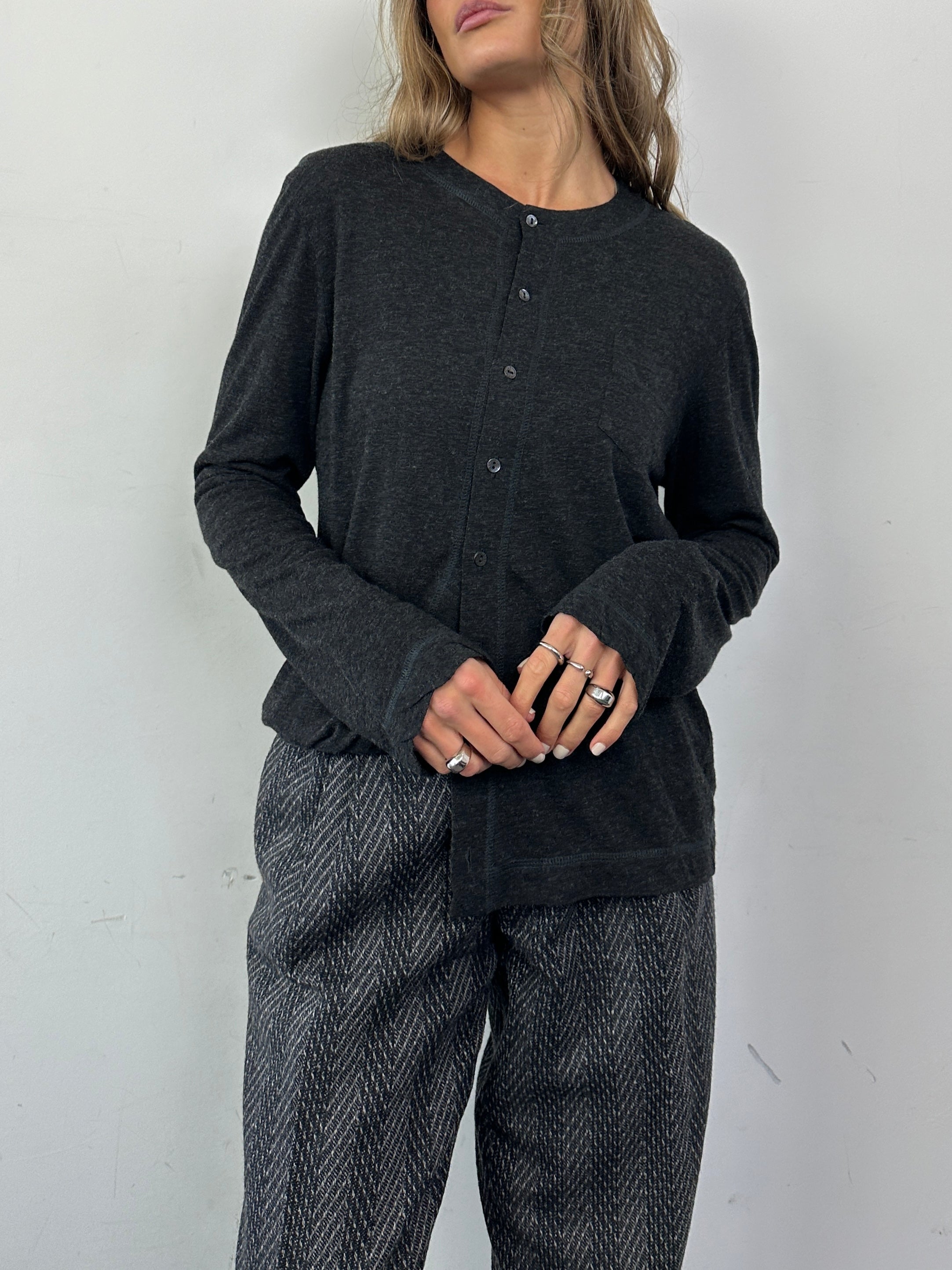 Dolce & Gabbana wool long sleeve T-shirt in lightweight design, stylish PJ style, in size M, shown in black fabric with subtle branding.