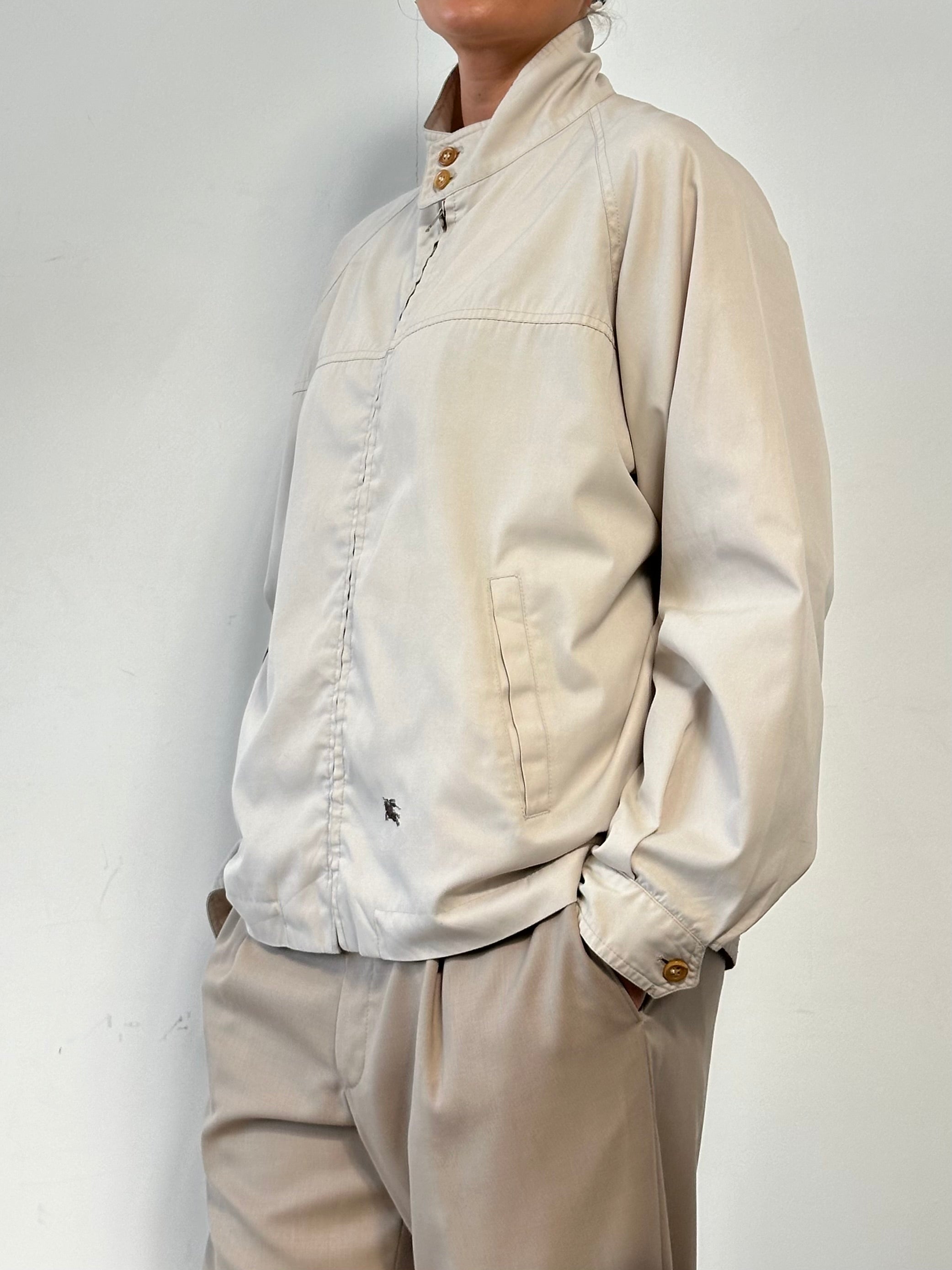 Burberry Nova Check logo bomber jacket in size L, featuring classic check pattern, ribbed cuffs, and front zipper closure.