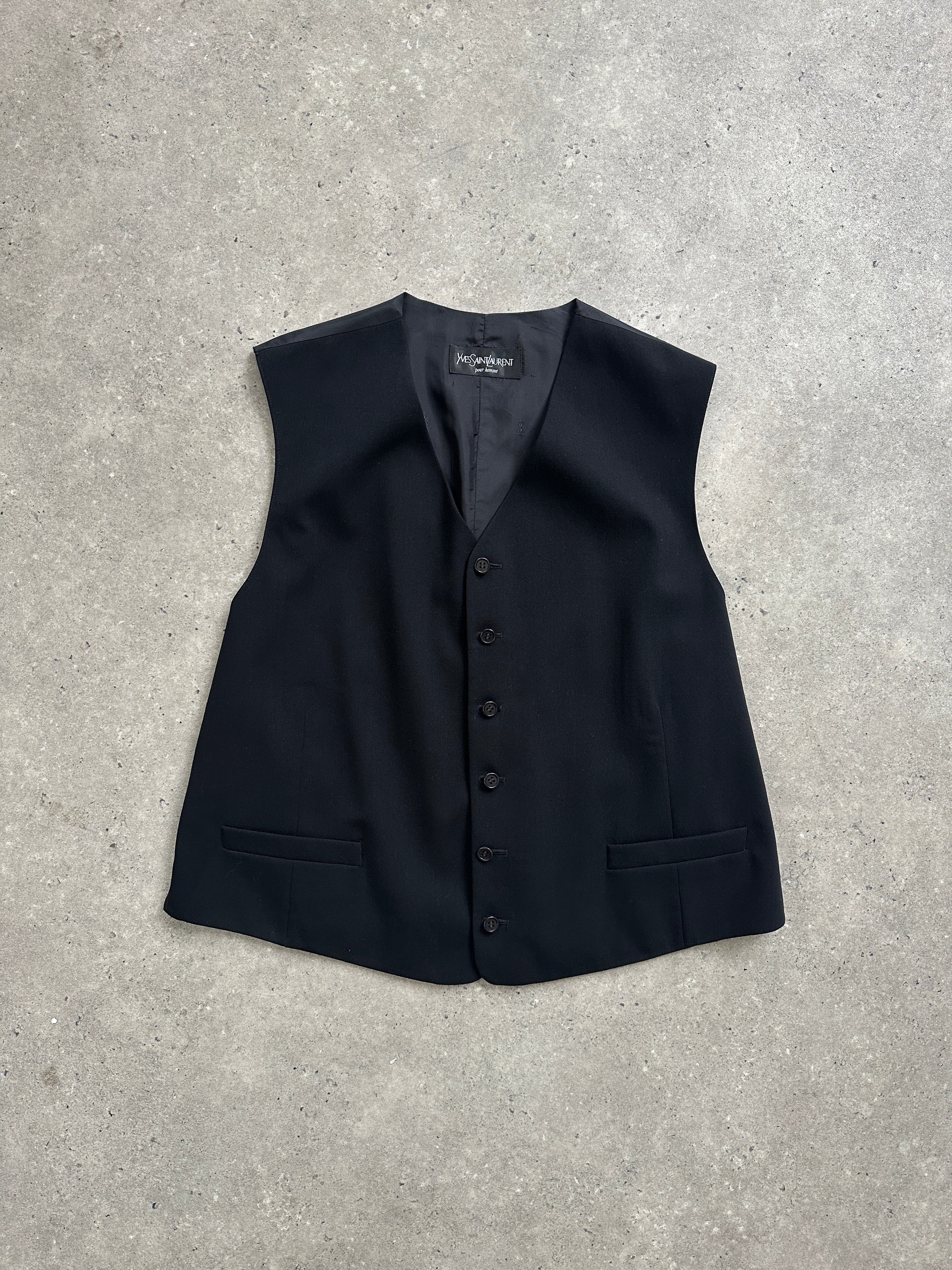 Yves Saint Laurent pure wool tailored waistcoat in size 46R/XL, featuring a classic design and structured fit.
