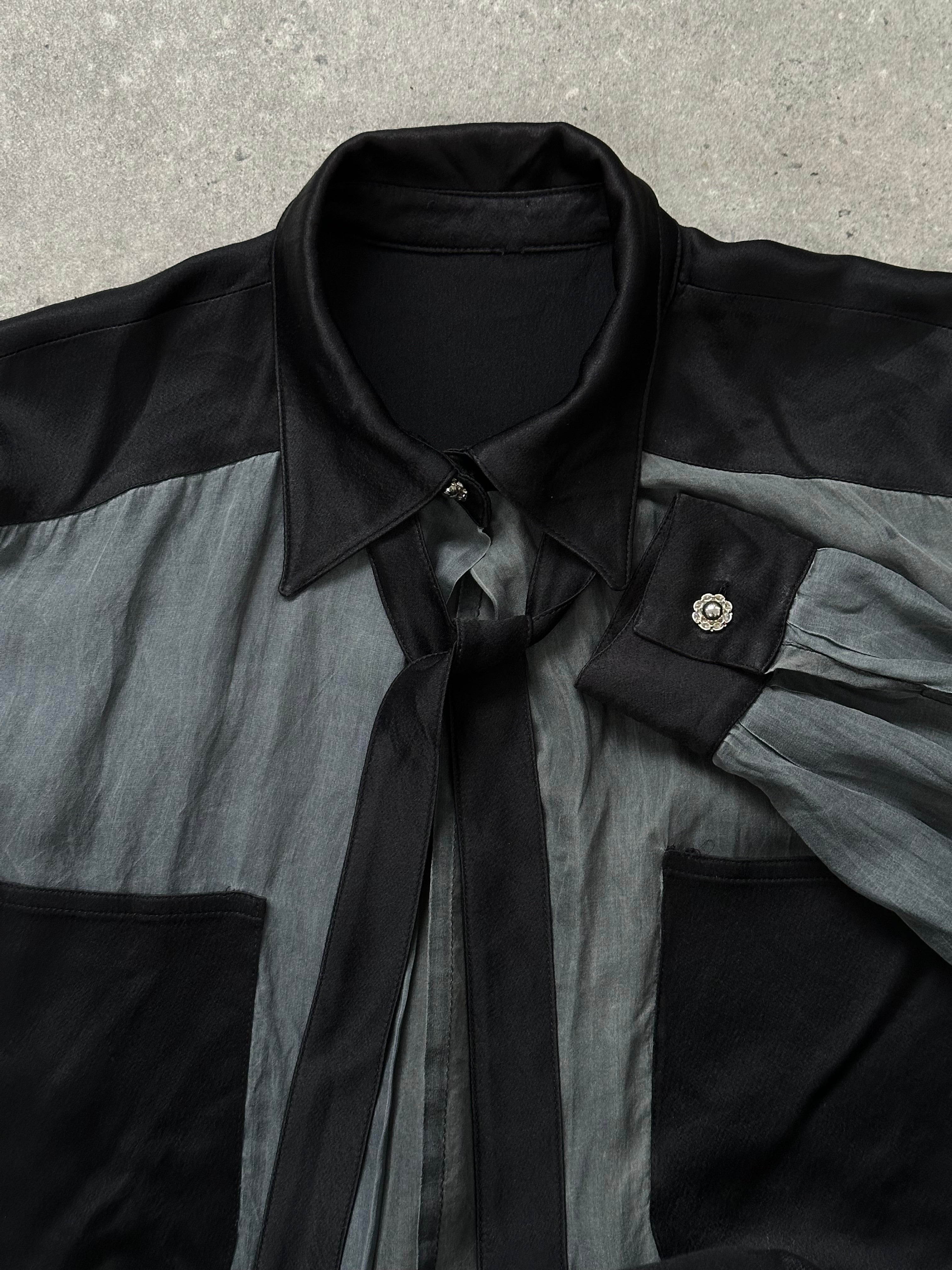 Vintage 1990s sheer satin tie neck shirt in size M, featuring a classic design with a relaxed fit and elegant collar detail.