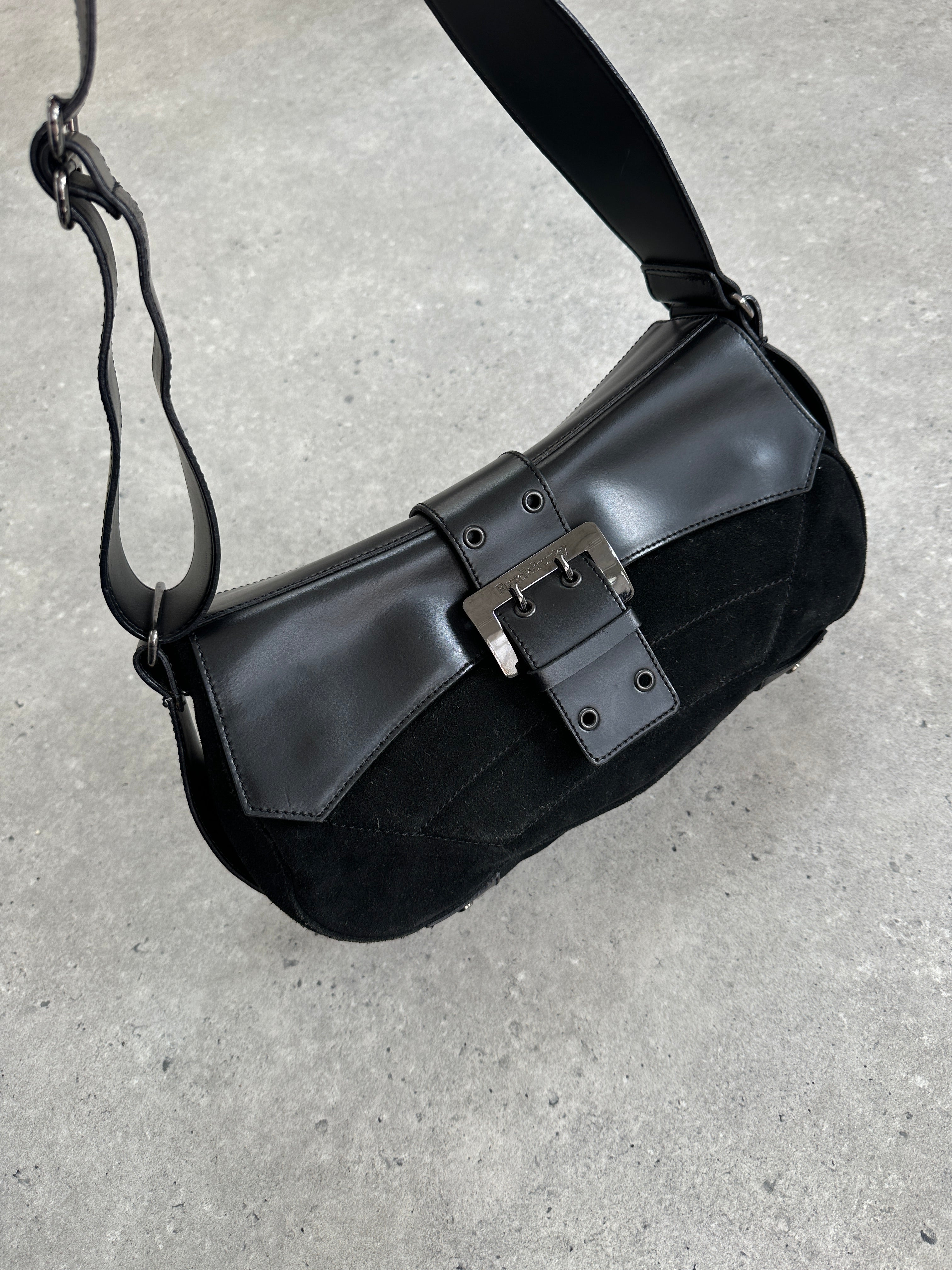 Vintage Russell & Bromley 00s leather suede shoulder bag with a classic design and structured shape.