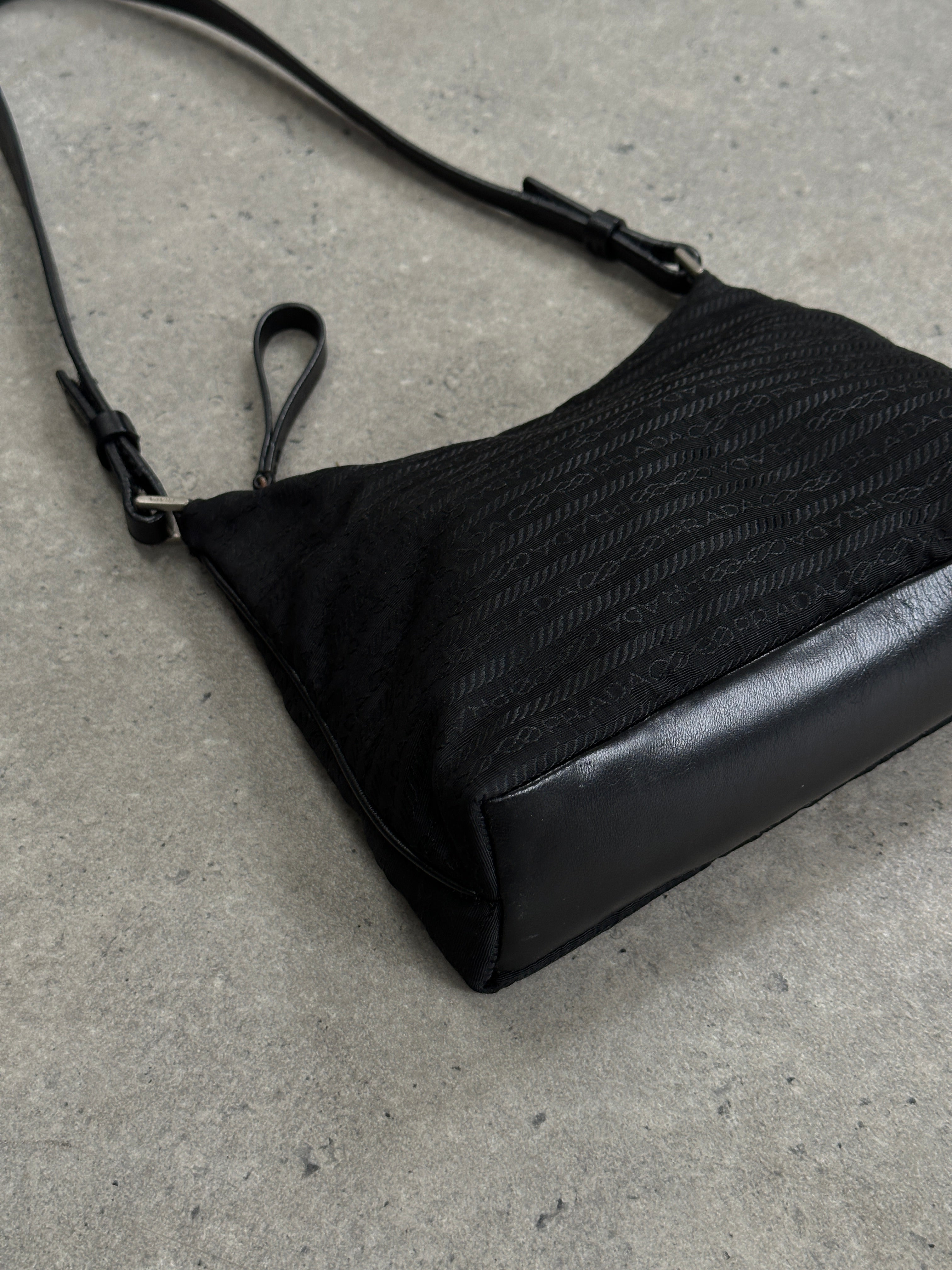 Prada Nylon Tessuto Monogram Crossbody Bag with adjustable strap and signature logo, featuring a sleek, durable nylon design.